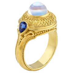 Kent Raible 18 Karat Gold Rainbow Moonstone and Blue Sapphire Dome Ring