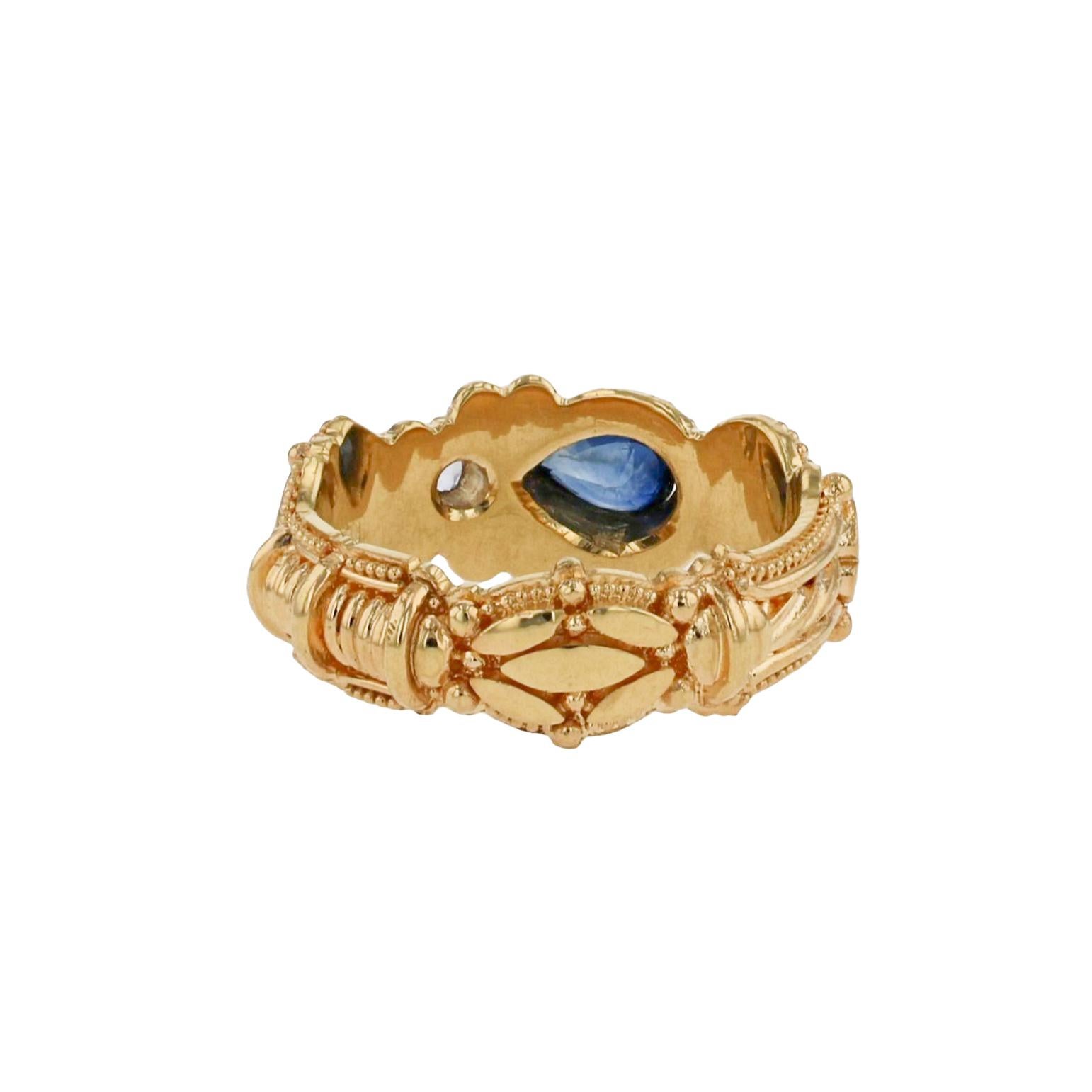 Mixed Cut Kent Raible 18 Karat Gold Spontaneity Ring, Blues Sapphire and Intricate Detail For Sale