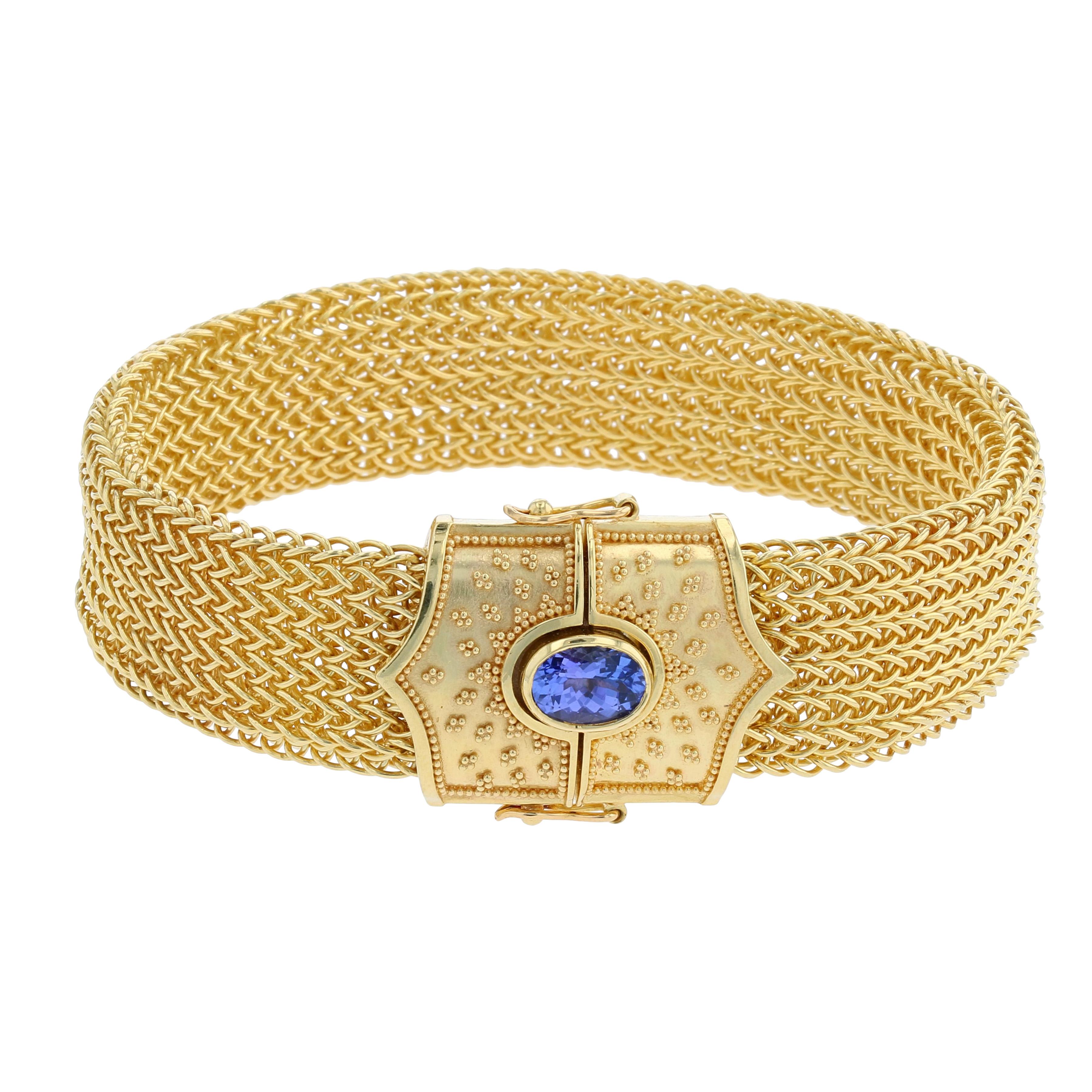 From his limited edition 'Studio Collection', Kent Raible's elegant and supple hand woven chain bracelet presents a beautifully granulated shield, with the clasp hidden within! This bracelet is a great width, stacks well with other bracelets and is