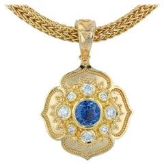 Pendentif fleuron Kent Raible en or 18 carats et saphir bleu naturel, pour collier