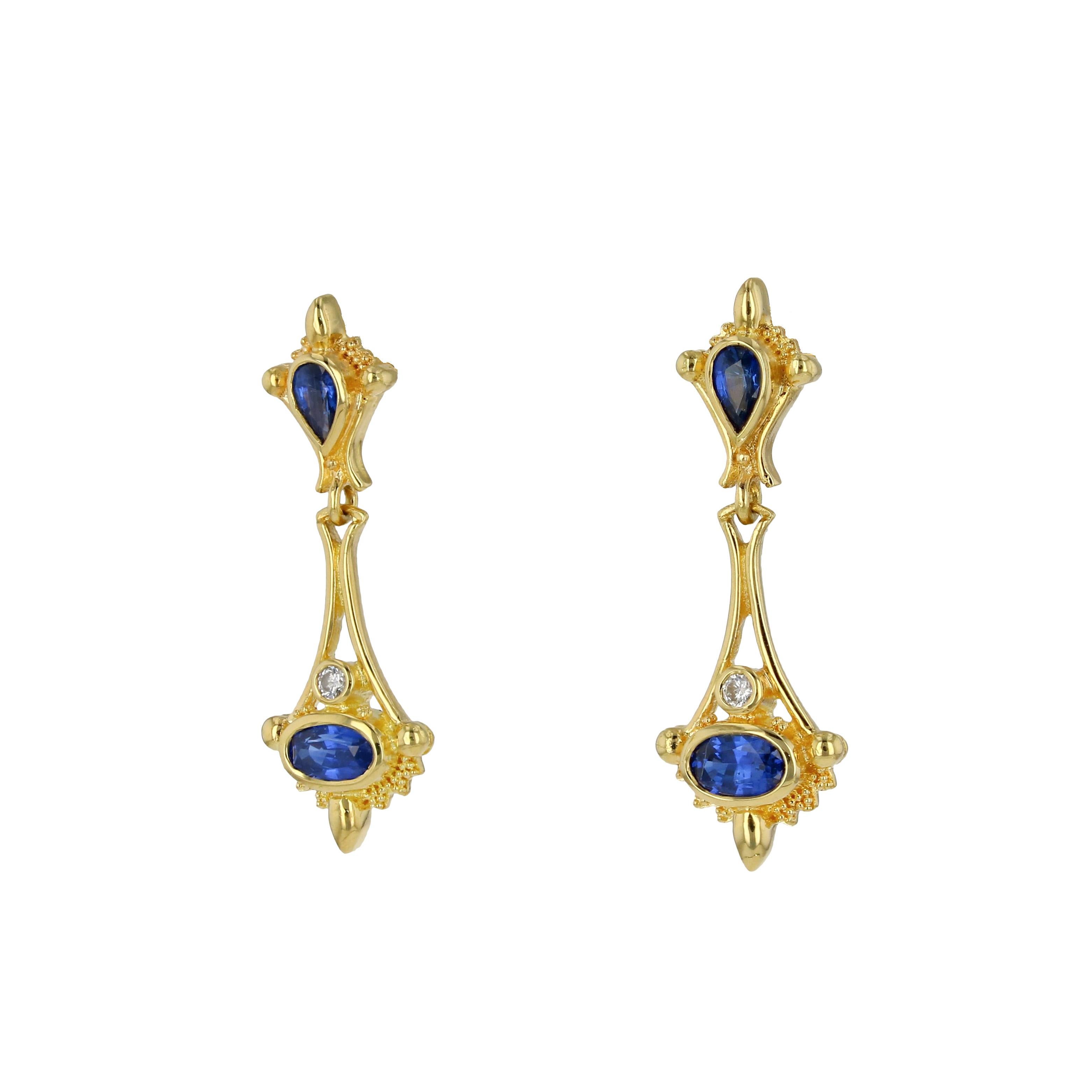 From the Kent Raible limited edition 'Studio Collection' we share with you the Blue Sapphire and Diamond earrings. 

The lovely proportions and fine detail of these elegant earrings move easily from day wear to a night out. 
The bottom portion of