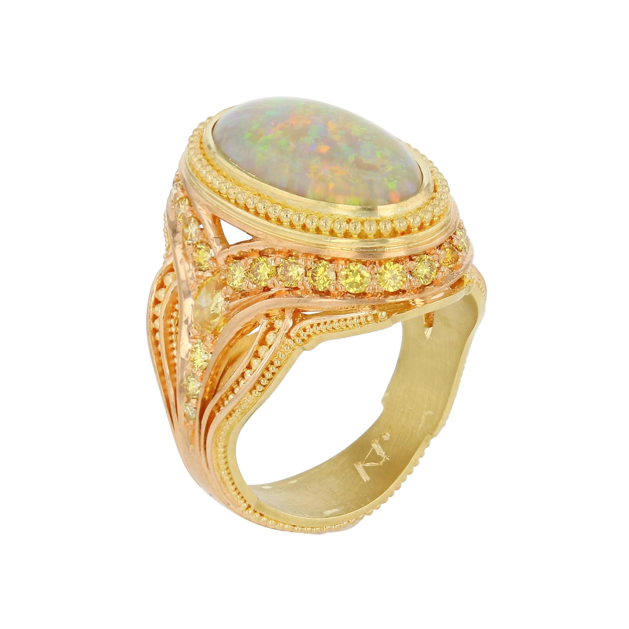 Opale de cristal australienne 4,34ct
Diamant jaune-Br .43ct poires. .87ct 19-20 ronds
7,0 grammes d'or 20K
6,0 grammes d'or 18 carats

Taille 8.25+

Contrairement à la plupart des bijoux 