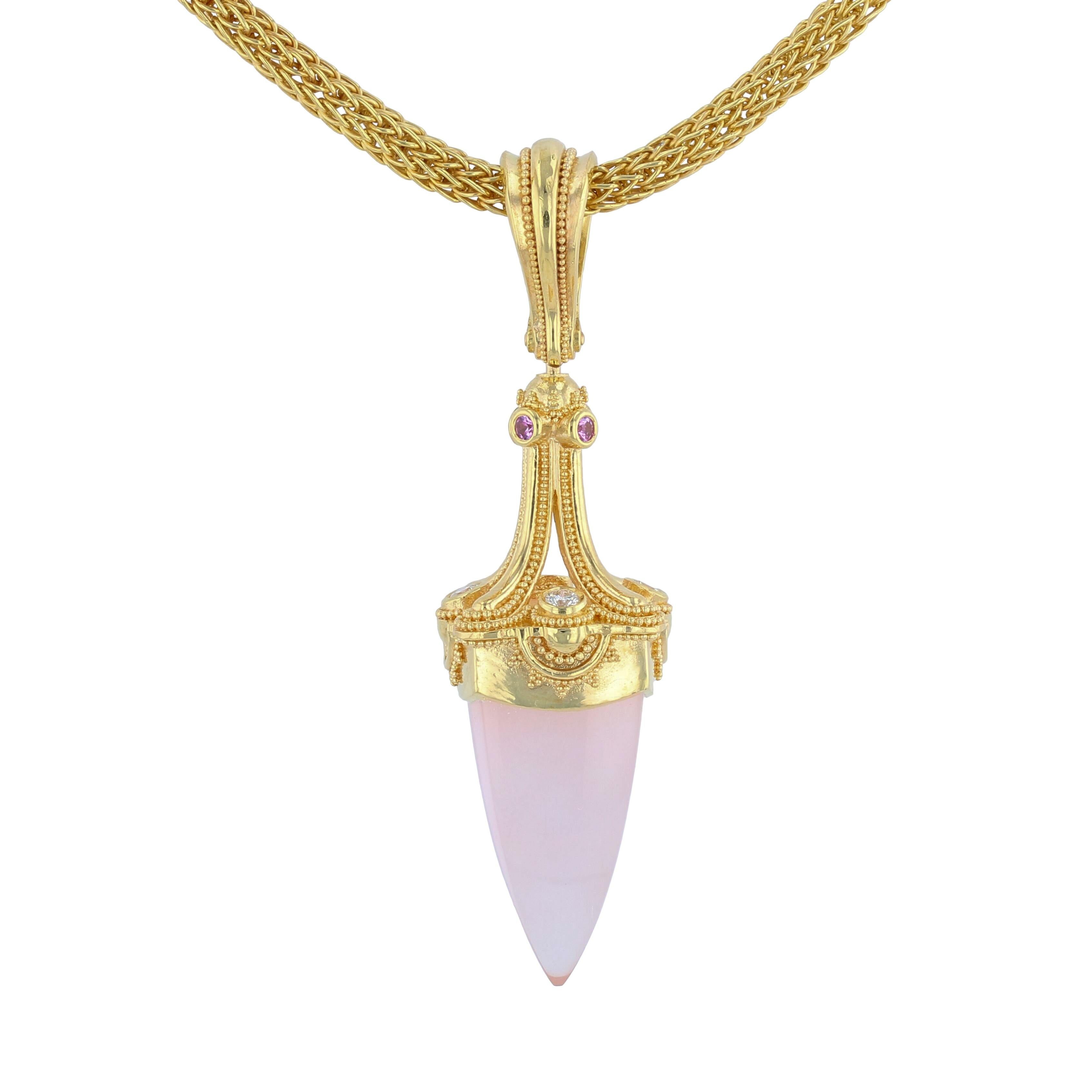 From the Kent Raible limited edition 'Studio Collection' we bring you The Rose Quartz Pendulum Pendant necklace enhancer. The open design gives the piece an etheric floating quality that much of Raible's work exhibits. Raible cut the Rose Quartz