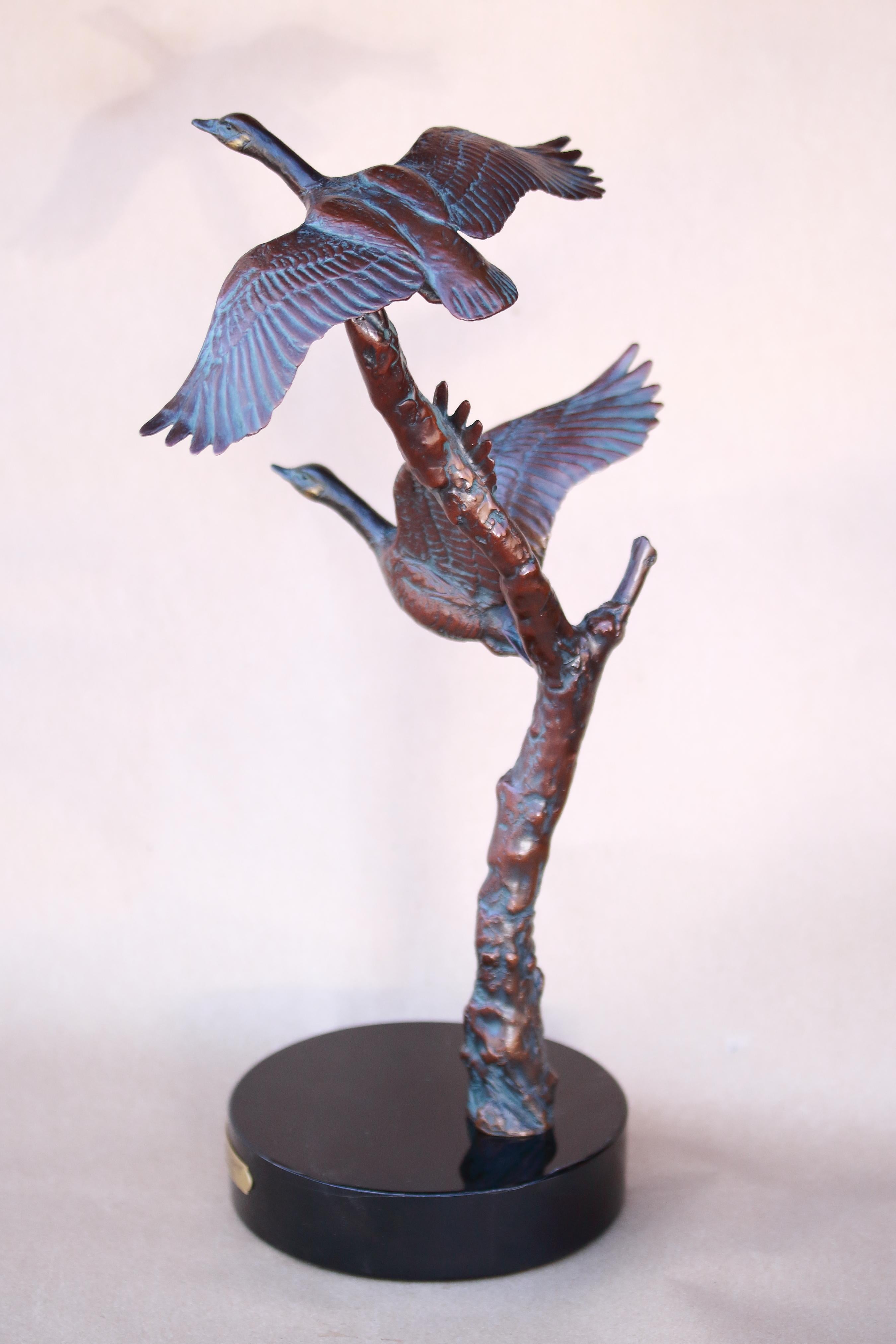 Signed/inscribed by Artist on bronze base of the piece with an edition number.
59/300