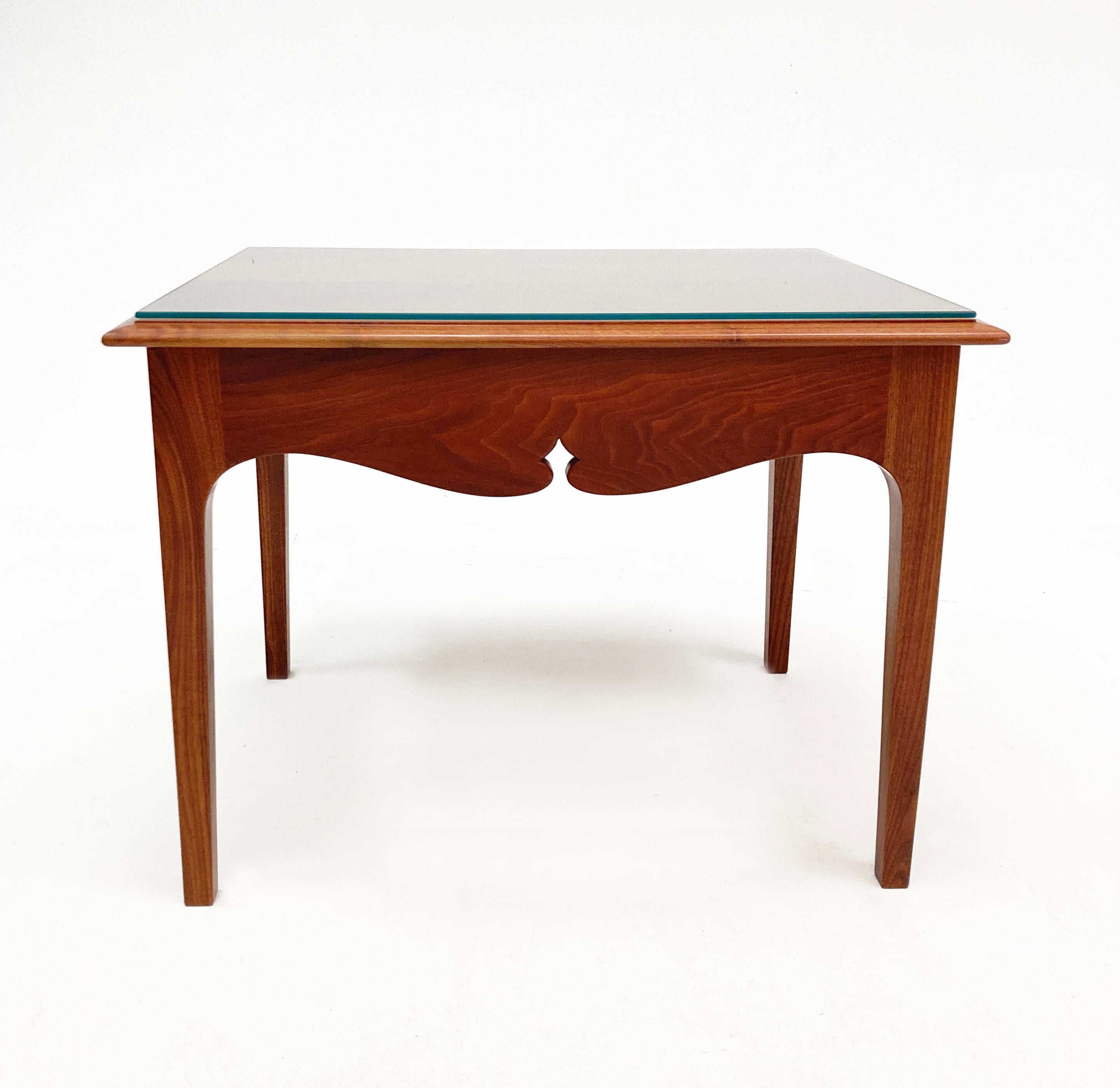 This stunning Kentucky hand-crafted walnut table is perhaps the most perfectly crafted and finished piece of furniture we’ve laid hands on. Every inch, exposed and otherwise are beautifully and impeccably finished and smooth as silk. The skirt is