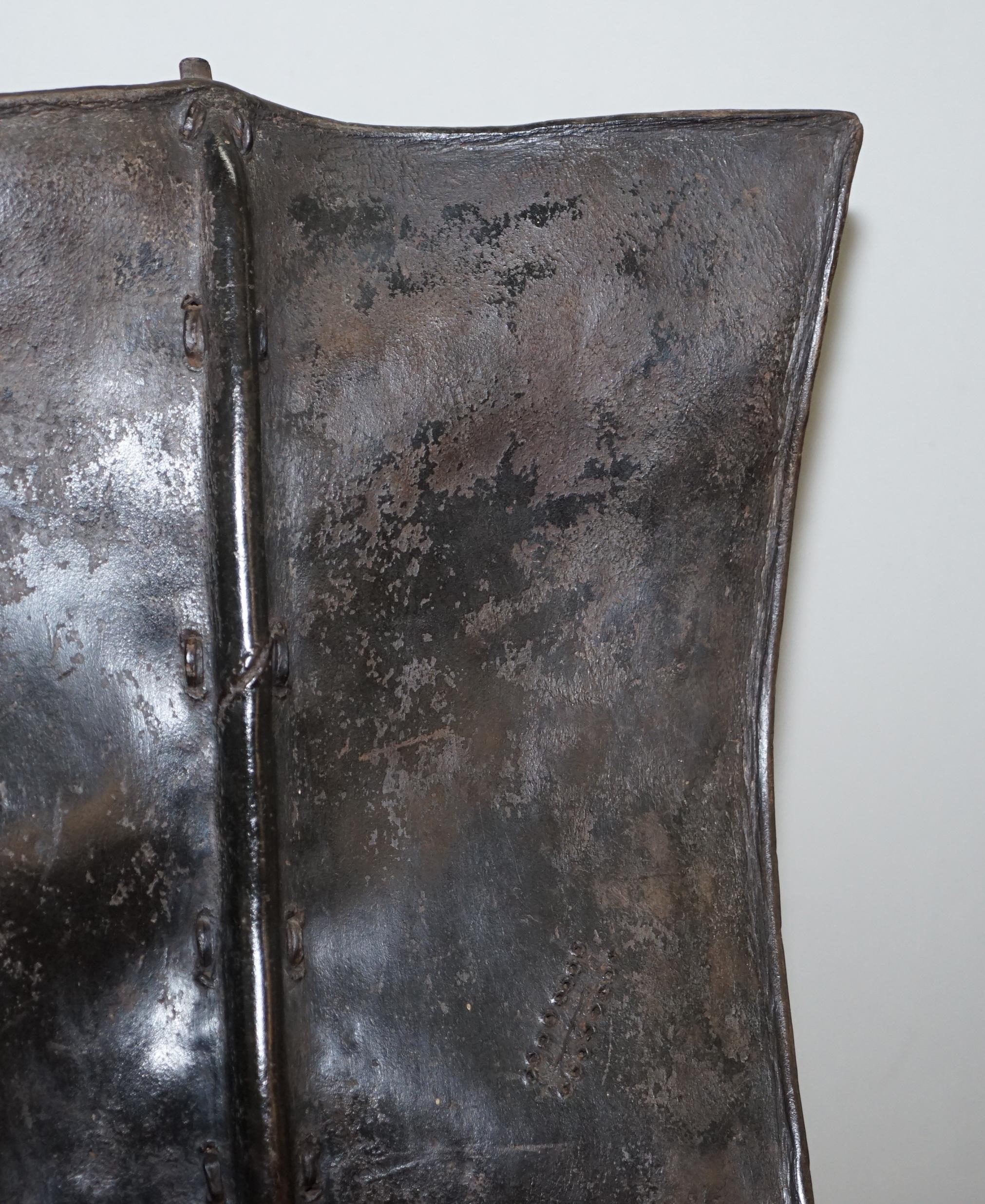 Kenyan African Turkana Leather and Iron Fighting Shield Regency Hardwood Base For Sale 7