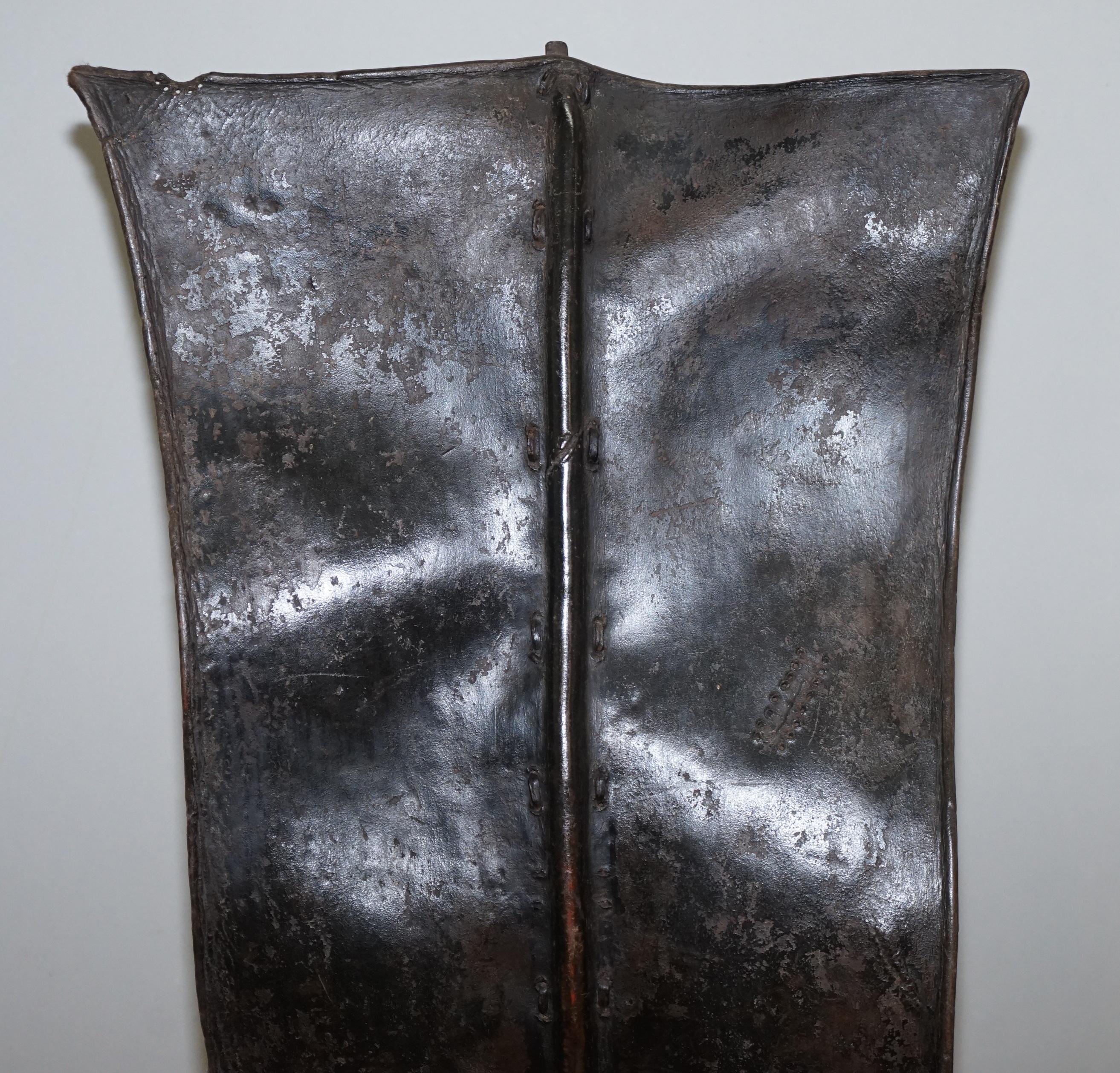 Kenyan African Turkana Leather and Iron Fighting Shield Regency Hardwood Base For Sale 4