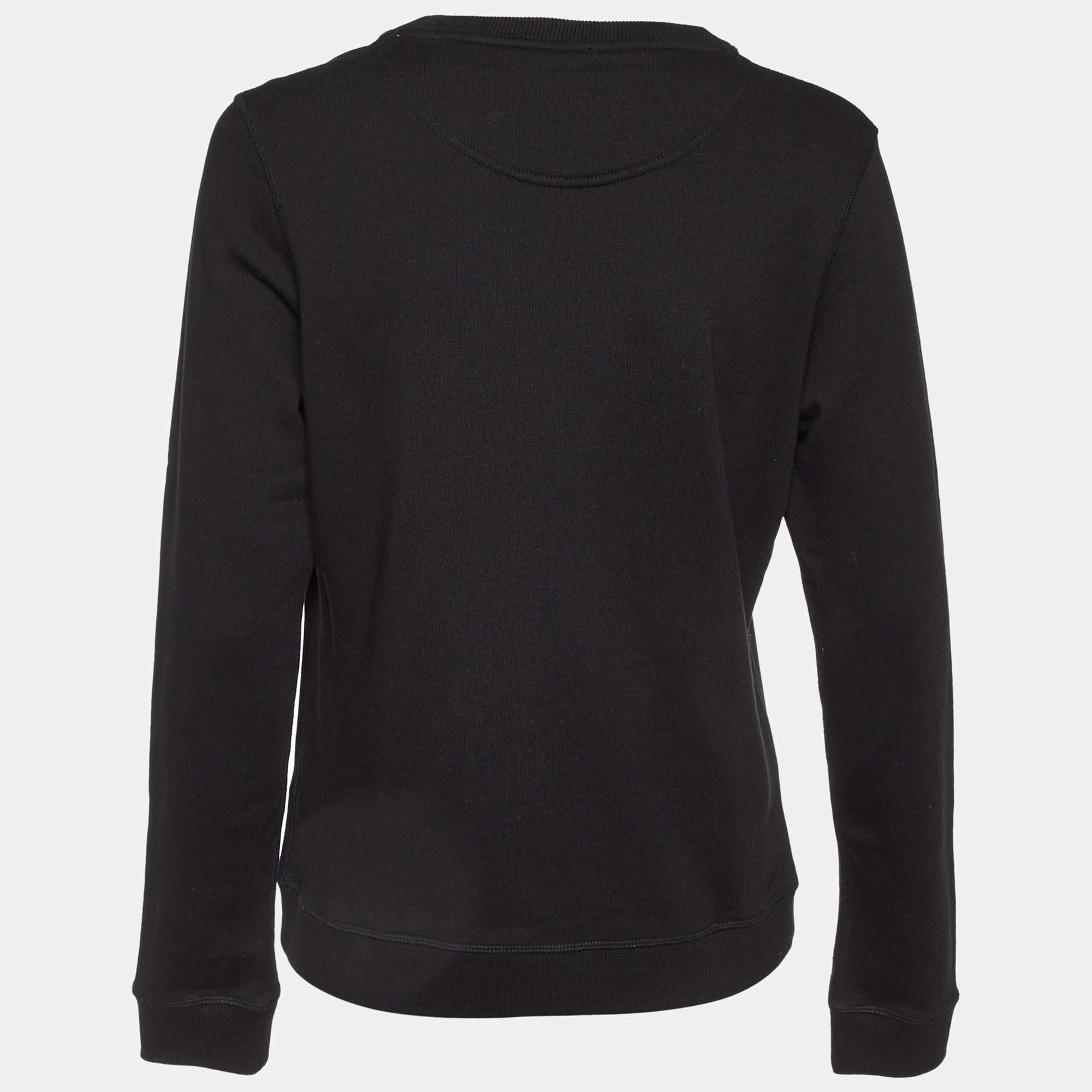 Discover the epitome of cozy chic with this Kenzo womens sweatshirt. Crafted for both warmth and style it combines comfort with fashion forward detailing making it your go to choice for casual sophistication.