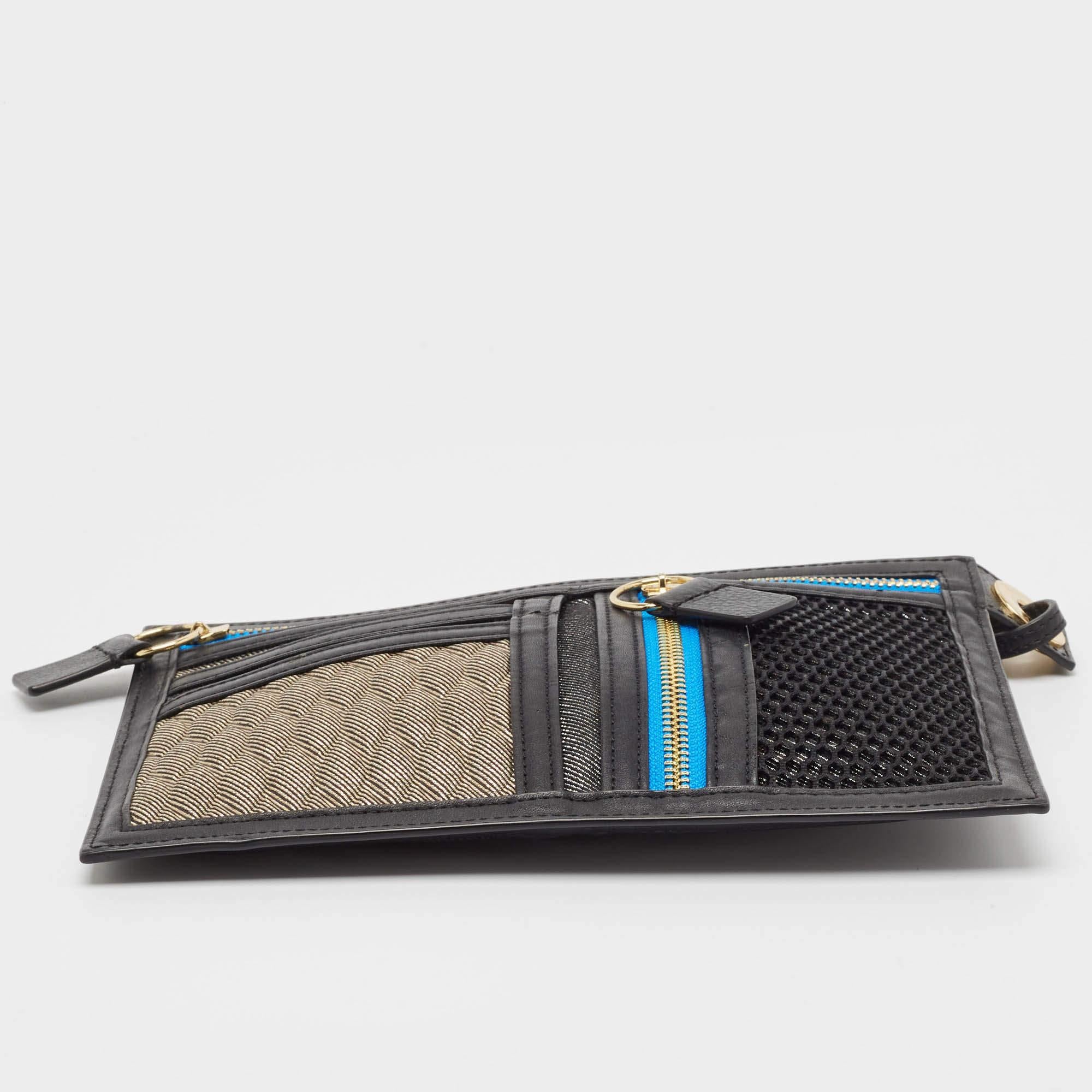 Kenzo, astuccio organizer in pelle e tessuto nero/multicolore in vendita 2