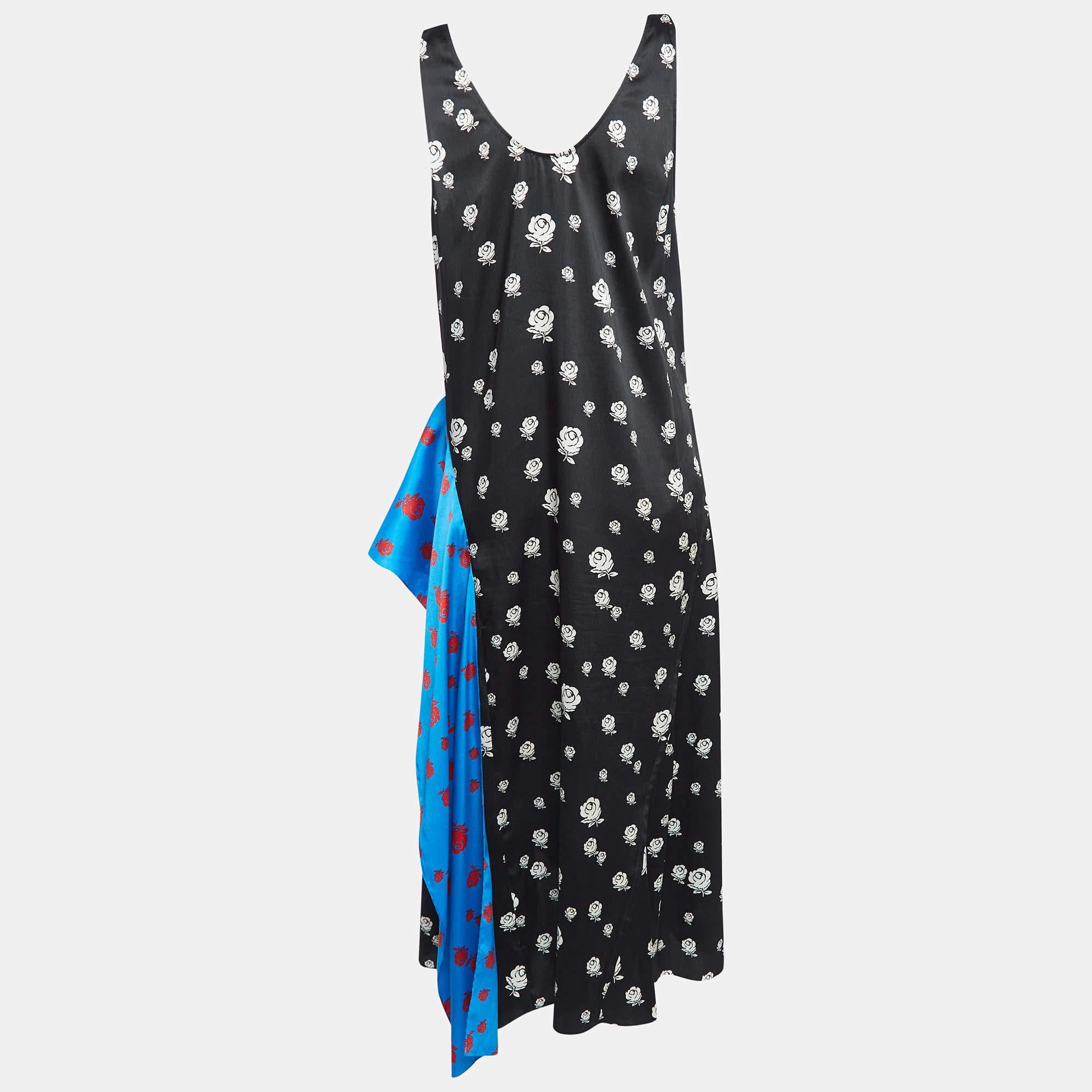 This stylish midi dress exudes elegance and sophistication. Its flattering length falls between the knee and ankle offering a versatile option for various occasions. With its chic design it combines modern trends with timeless charm making it a must