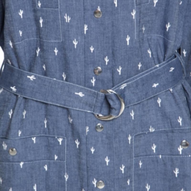 Make a fantastic style statement by pairing this Kenzo dress with offbeat accessories. It features a white cactus print all over the blue background. Tailored in cotton, this shirt dress is complete with long sleeves and a belt at the waist.