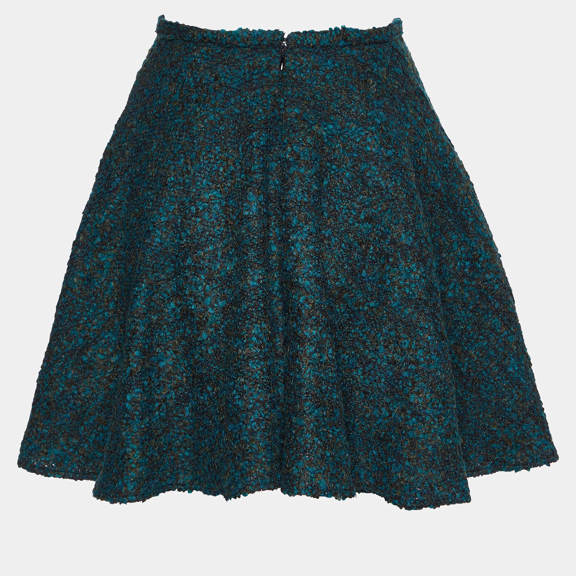 This elegant skirt is worth adding to your closet Crafted from fine materials it is exquisitely designed into a flattering shape.