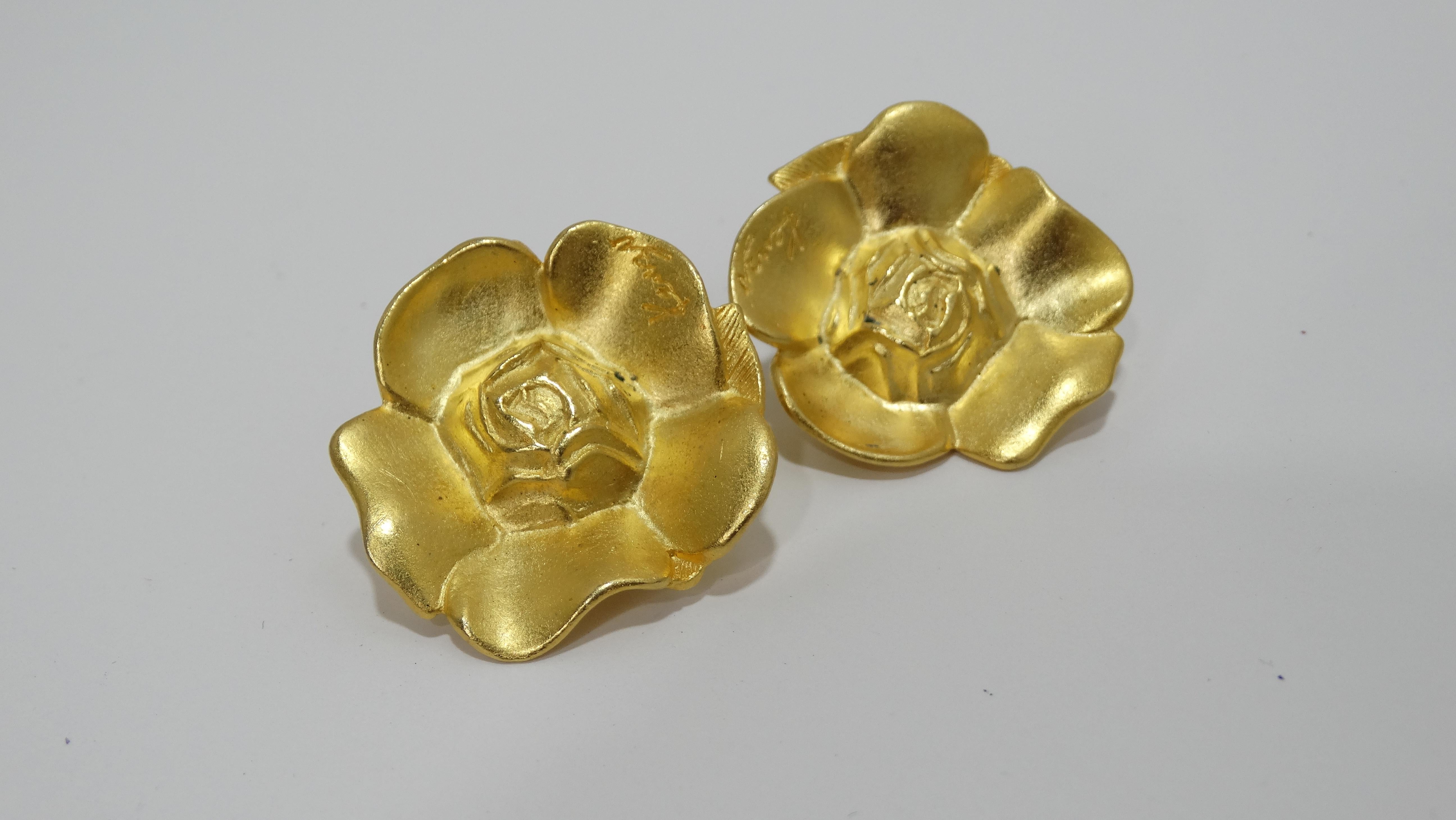 Get your hands on some rare vintage Kenzo jewelry! Dramatic with rich gold tones, these vintage Kenzo floral earrings are from the 1990's and made in Paris. The design features a detail floral casting plated with a brilliant gold tone plate. Pair