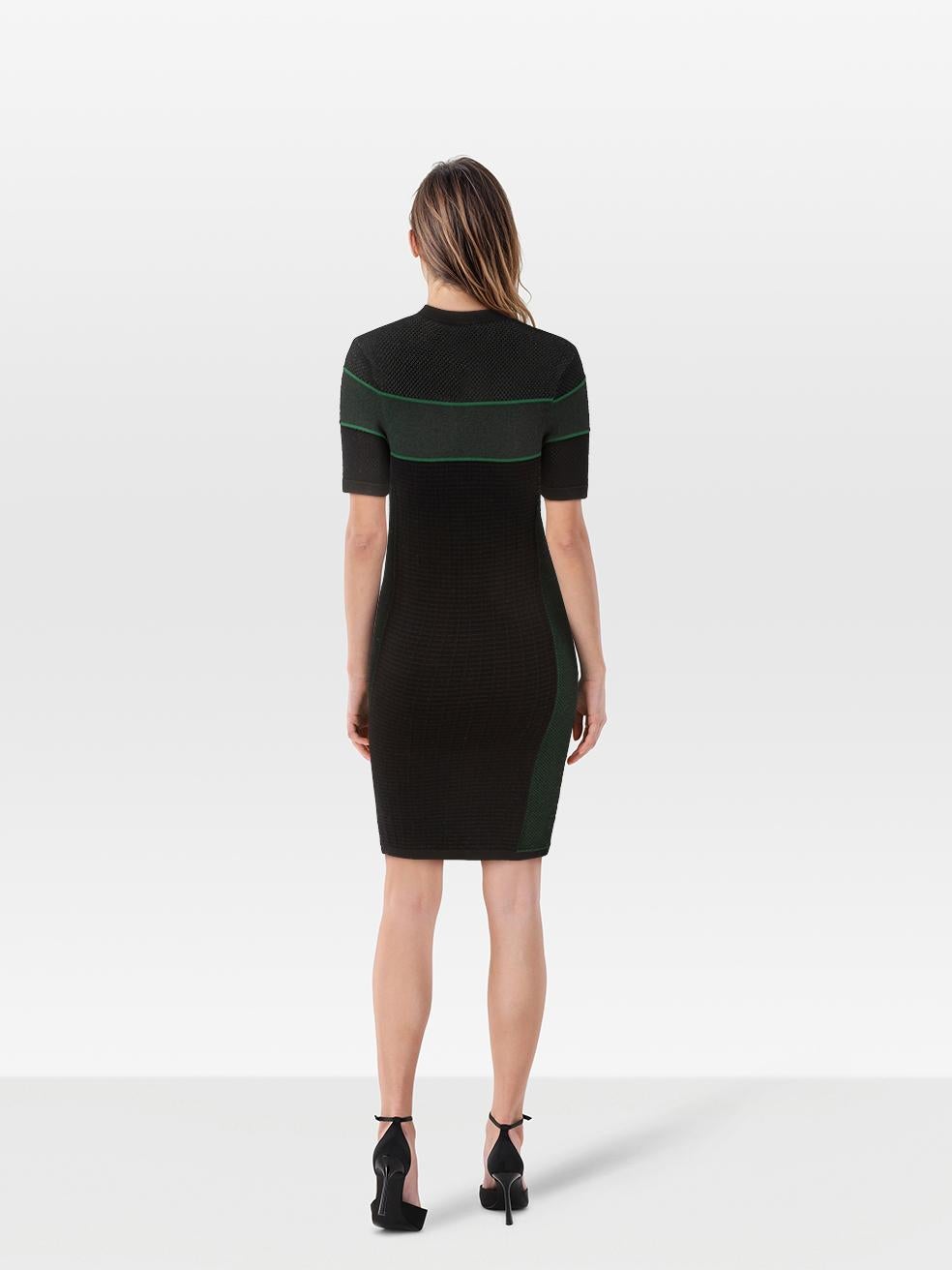 CONDITION is Very good. Minimal wear to the dress is evident. Plucks to the weave across the front and back of this used Kenzo designer resale item.
 
 
 
 
 
 Details
 
 
 Multicolour- green, black
 
 Viscose
 
 Dress
 
 Stretchy
 
 Bodycon
 
 Knee