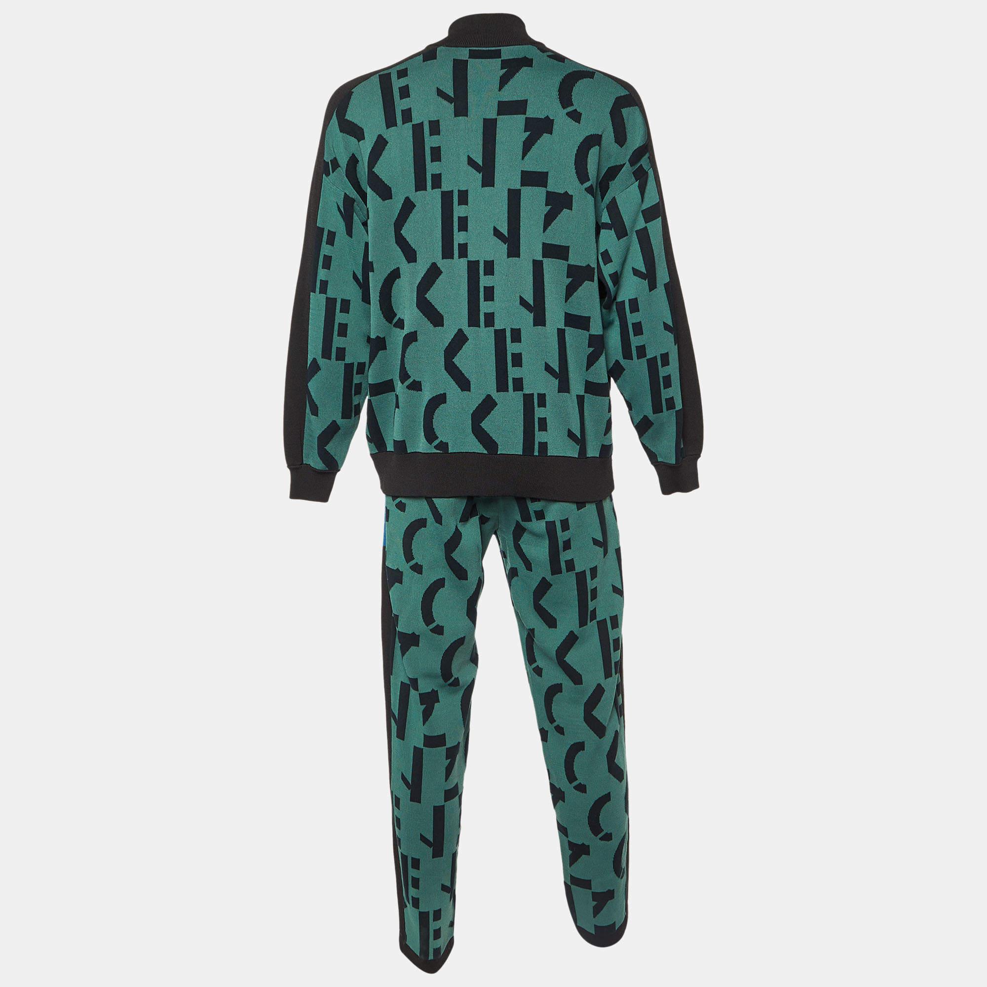 The Kenzo suit set embodies casual luxury with its soft knit fabric and vibrant green hue. Featuring the iconic Kenzo logo prominently displayed, this set offers both comfort and style for leisurely days or active pursuits.

