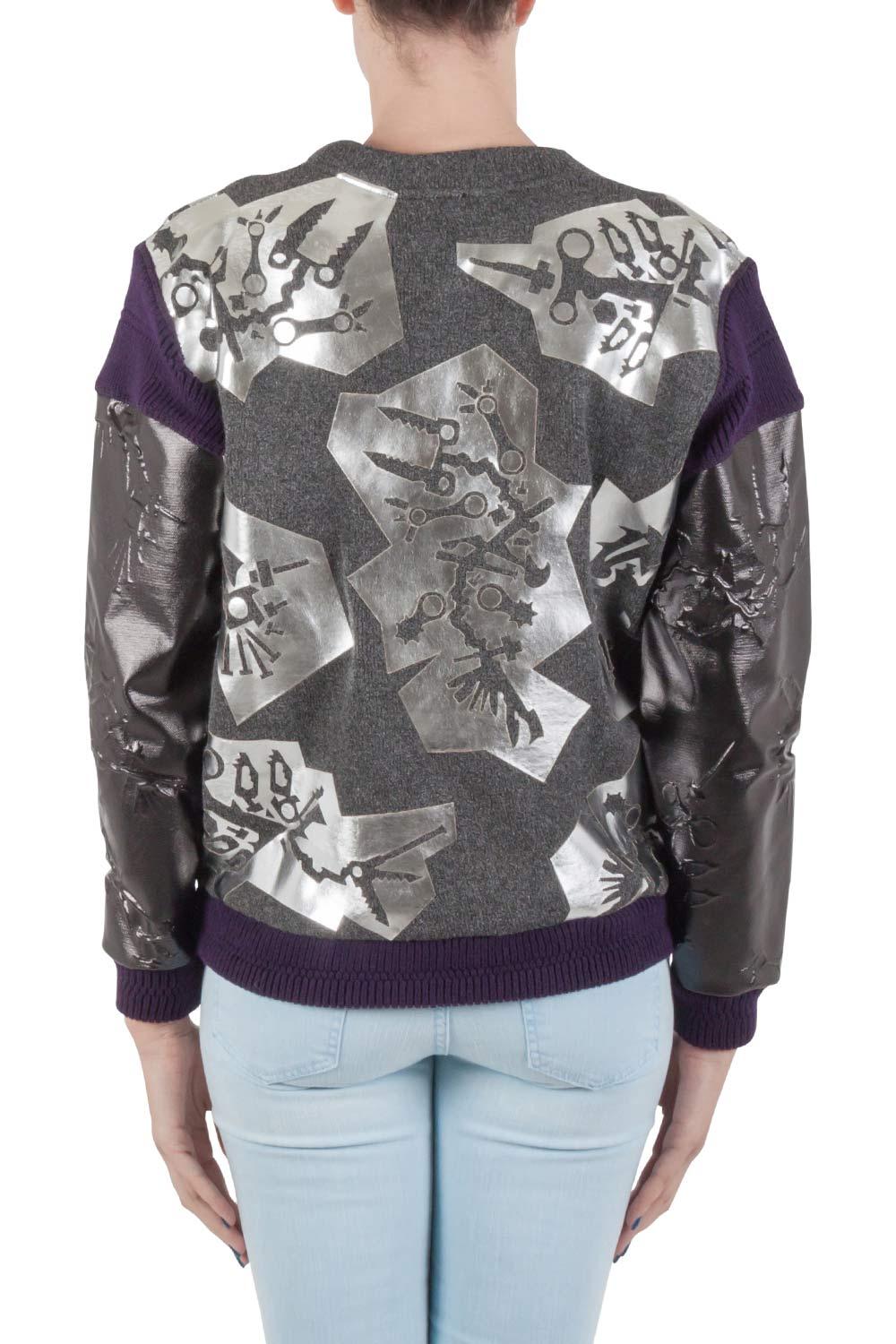 This multi fabric sweatshirt comes in grey color with eliciting monster foil print. The creation is by Kenzo and features a rib trim on sleeves, hem and shoulders. Team it with dark bottoms and boots.

Includes: The Luxury Closet Packaging, Original