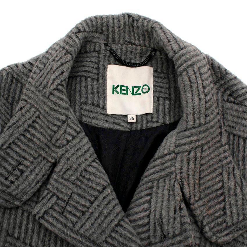 Kenzo Grey Patterned Wool & Mohair Brushed Double Breasted Coat

-Soft brushed texture
-Double-breasted style with button closures
-Two slant pockets on front
-Fully lined

Materials:
48% virgin wool
36% mohair
16% polyamide

Made in Romania
Dry