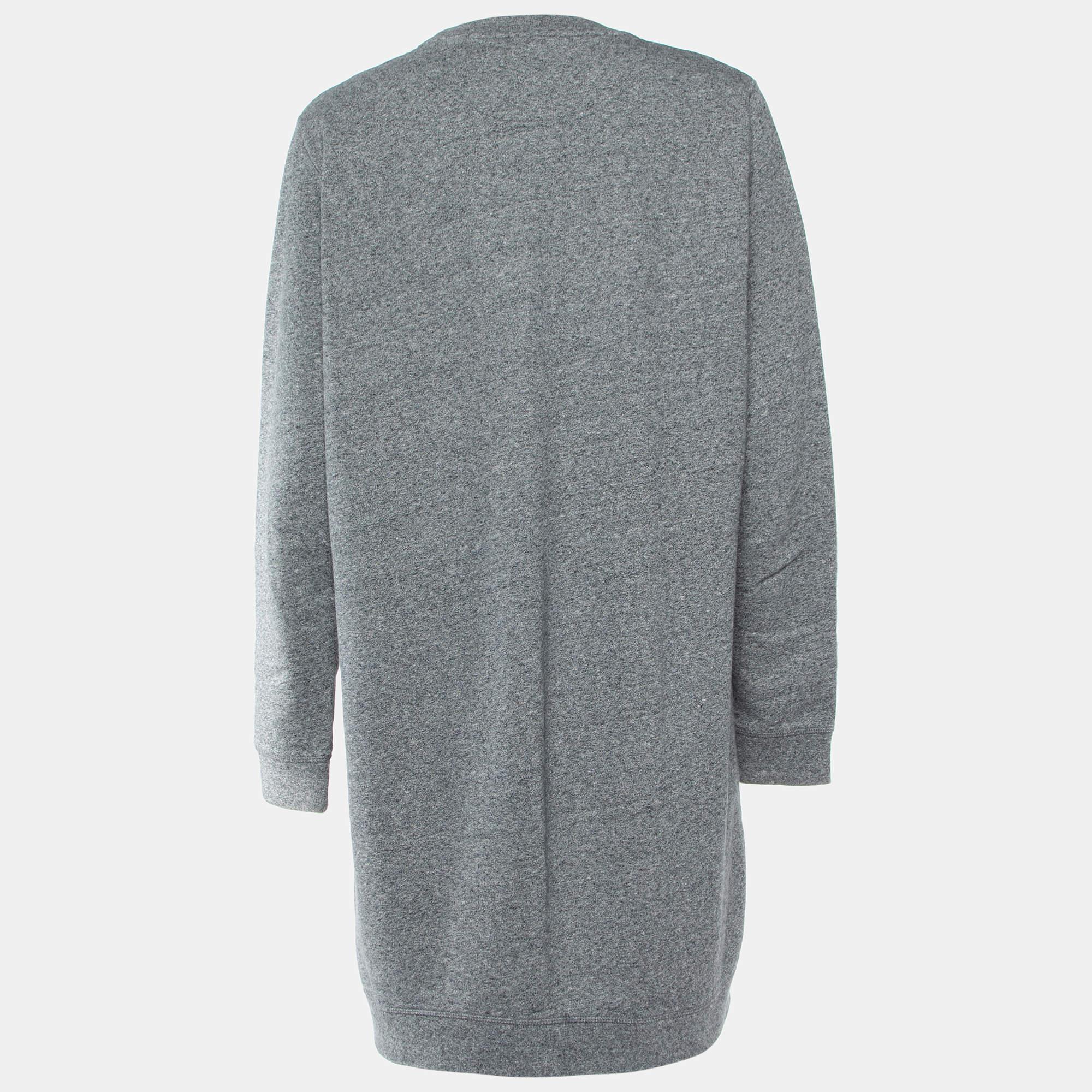 Wrap yourself in warmth and style with this Kenzo sweater dress. Meticulously crafted for comfort and fashion it epitomizes timeless sophistication. Each stitch reflects quality making it an essential piece for every wardrobe.