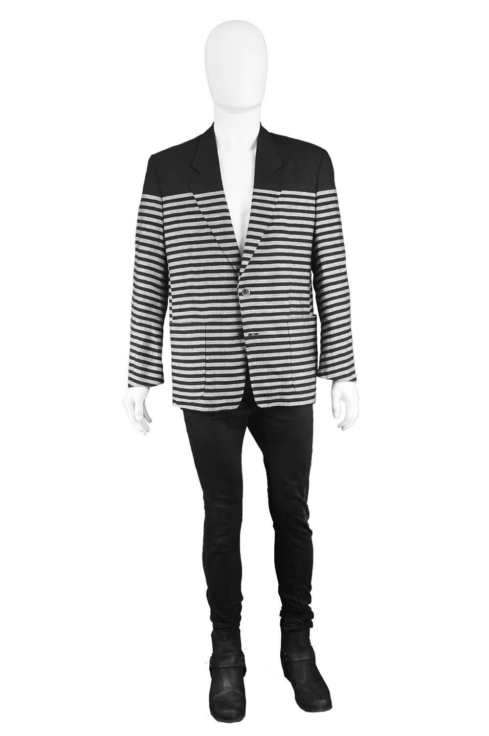 Kenzo Homme Vintage 1980's Linen & Wool Black & Gray Striped Men's Blazer Jacket

Estimated Size: Men's Medium. please check measurements. 
Chest - 42” / 106cm (allow a couple of inches room for movement)
Waist -38” / 96cm
Length (Shoulder to Hem) -