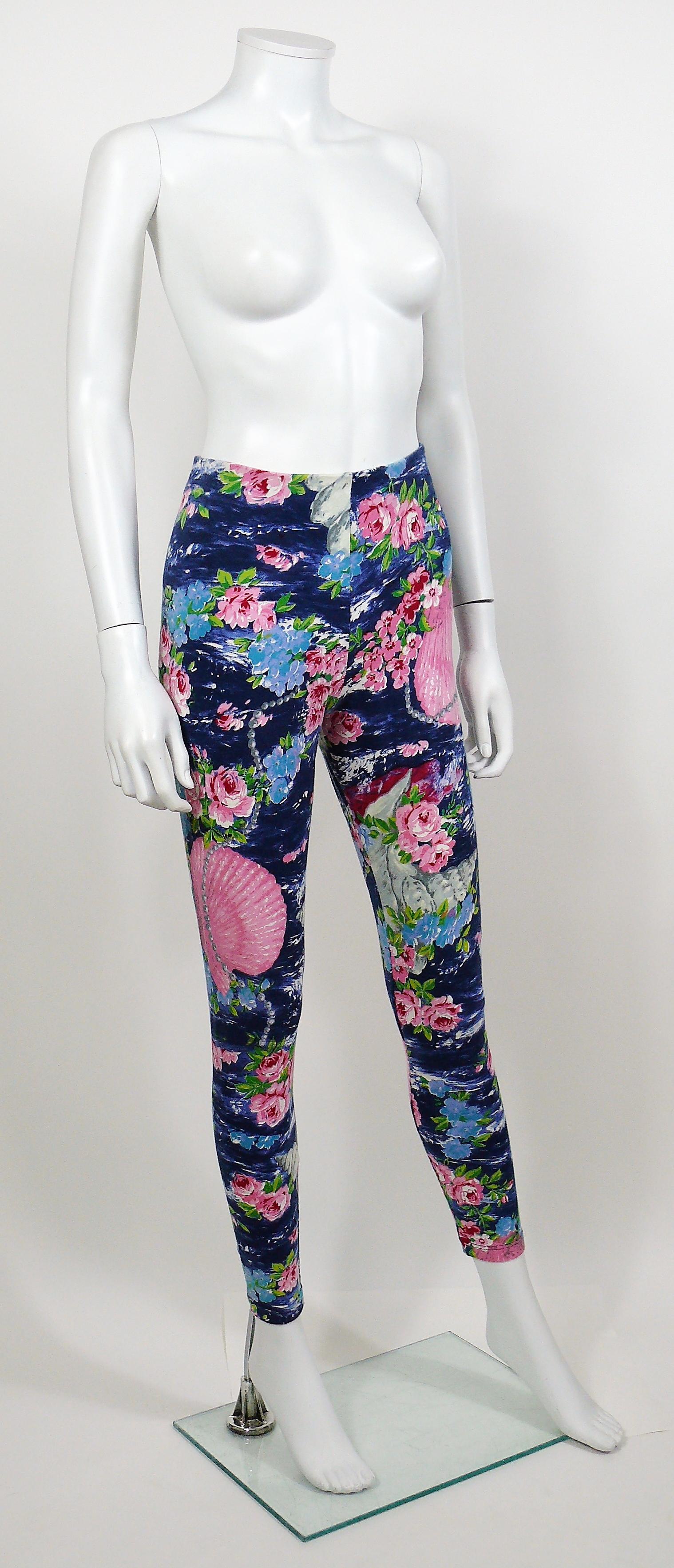 KENZO JUNGLE vintage leggings featuring an opulent floral, shell and pearl print.

Has stretch.
Elasticated waistline.

Label reads JUNGLE KENZO.
Made in Italy.

Missing size tag.
Please refer to measurements.

Composition tag reads : 90% Cotton /