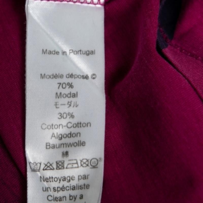 Dieses T-Shirt von Kenzo ist eine nahtlose Mischung aus Komfort, Luxus und Stil und ist ein absolutes Muss! Die Kreation aus einer Baumwollmischung in einem magentafarbenen Farbton wird durch Logoprints auf der Vorderseite aufgewertet. Das Modell