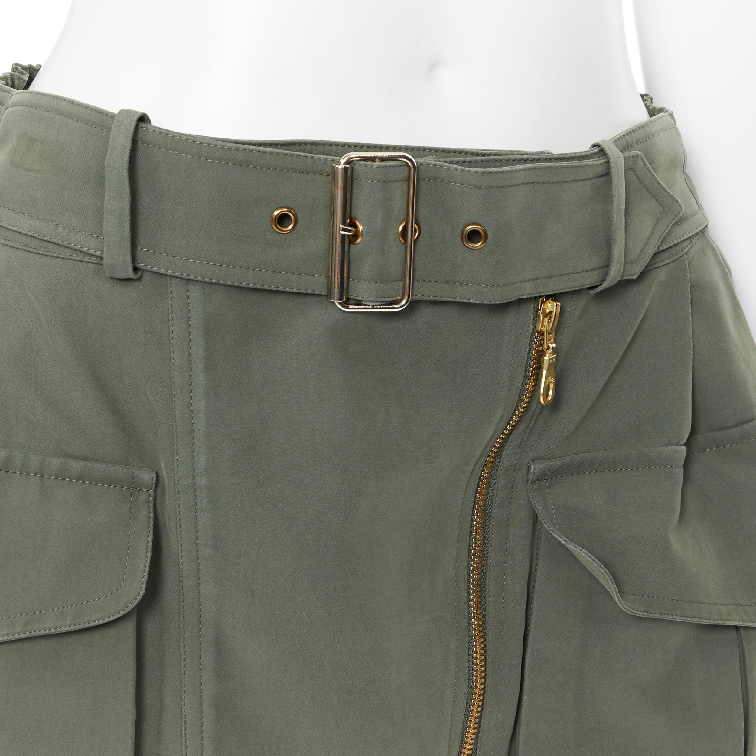 KENZO gonna militare in cotone verde kaki a due tasche con cintura elasticizzata Fr38
Marchio: Kenzo
Nome del modello / Stile: Gonna militare
Materiale: Cotone
Colore: verde
Modello: Tinta unita
Chiusura: zip
Materiale della fodera: