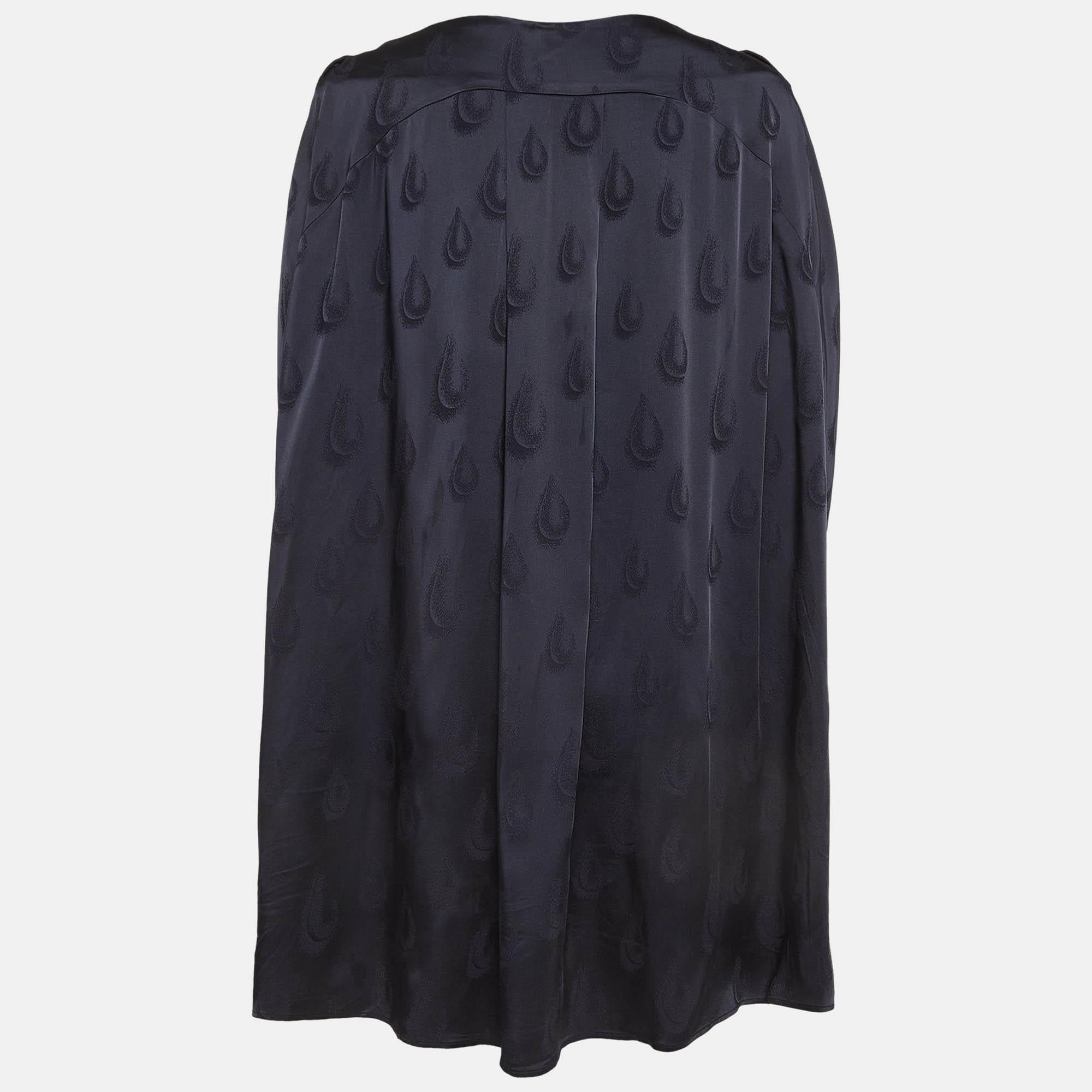 This designer dress is a chic and stylish garment that exudes elegance and sophistication. With its sleek design flattering silhouette and high quality craftsmanship this dress is perfect for any special occasion or evening event ensuring you stand