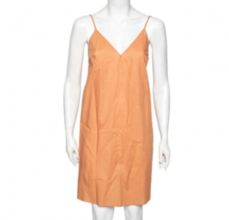 Set on a relaxed silhouette, this orange Kenzo shirt dress has a drawstring detailed waist. Crafted finely from cotton, it features short sleeves, front buttons, and two external pockets. Pair it with sneakers for a comfortable casual edit.