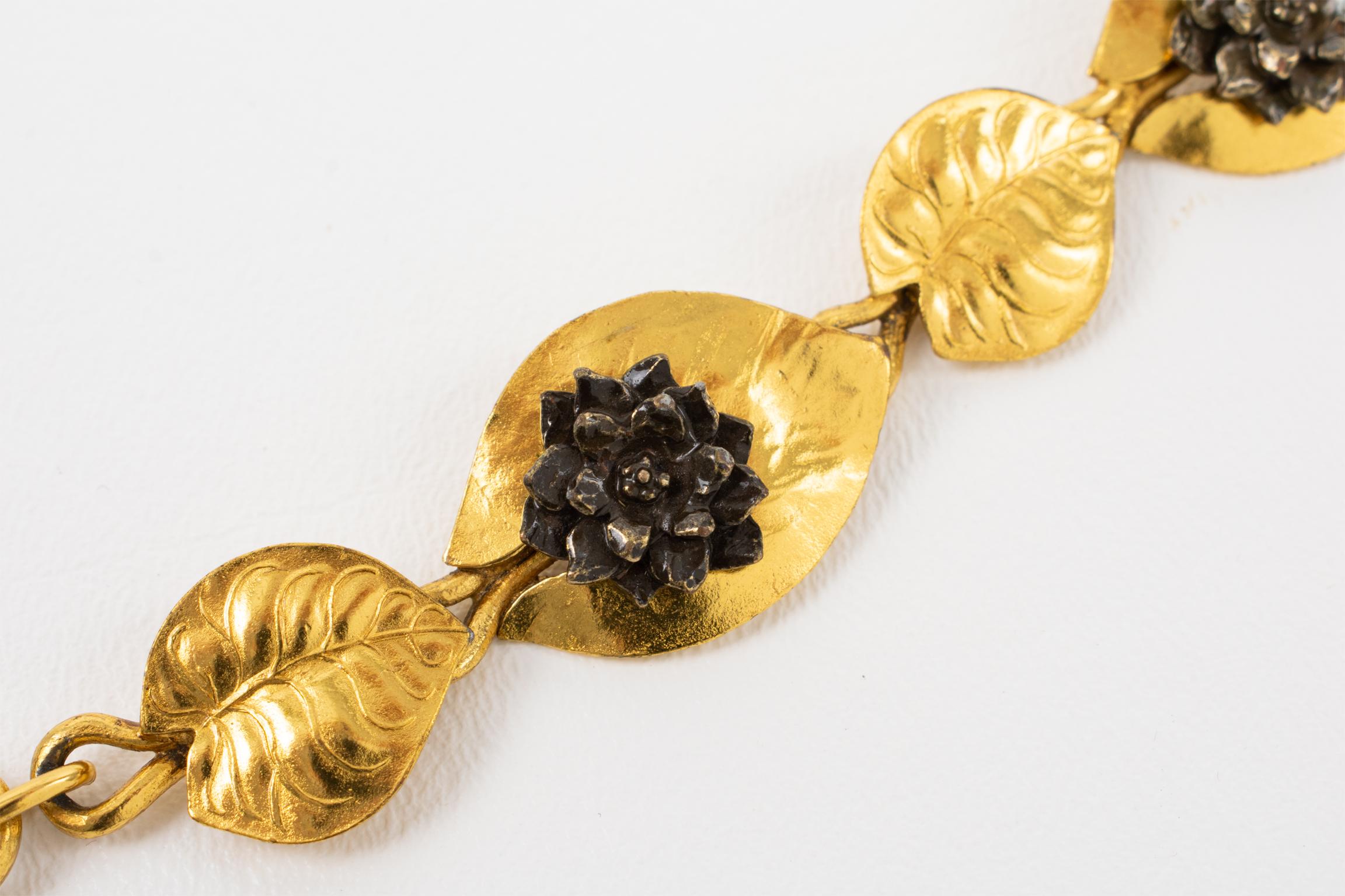 Kenzo Paris Gilt Metal and Bronze Water Lily Flowers and Leaves Link Bracelet In Good Condition For Sale In Atlanta, GA