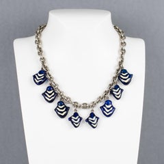 Collana Kenzo Paris in metallo argentato con charme in vetro di Murano