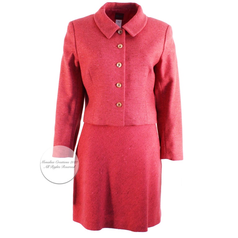 Lovely vintage Kenzo Paris jacket and skirt suit, 2pc set, most likely made in the 90s.  Made from a rich Lingonberry wool fabric, it's lightweight, chic and so easy to style together or separately.  Fully-lined, dry clean only.  Made in France. 