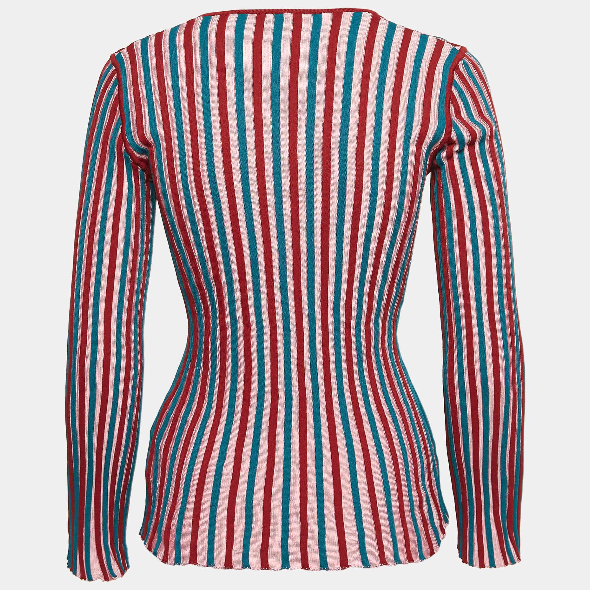 The Kenzo jumper is a luxurious and versatile wardrobe staple. Crafted from high quality rib knit fabrics it features a multicolor silhouette. This timeless piece seamlessly blends comfort with elevated style making it a must have for any fashion