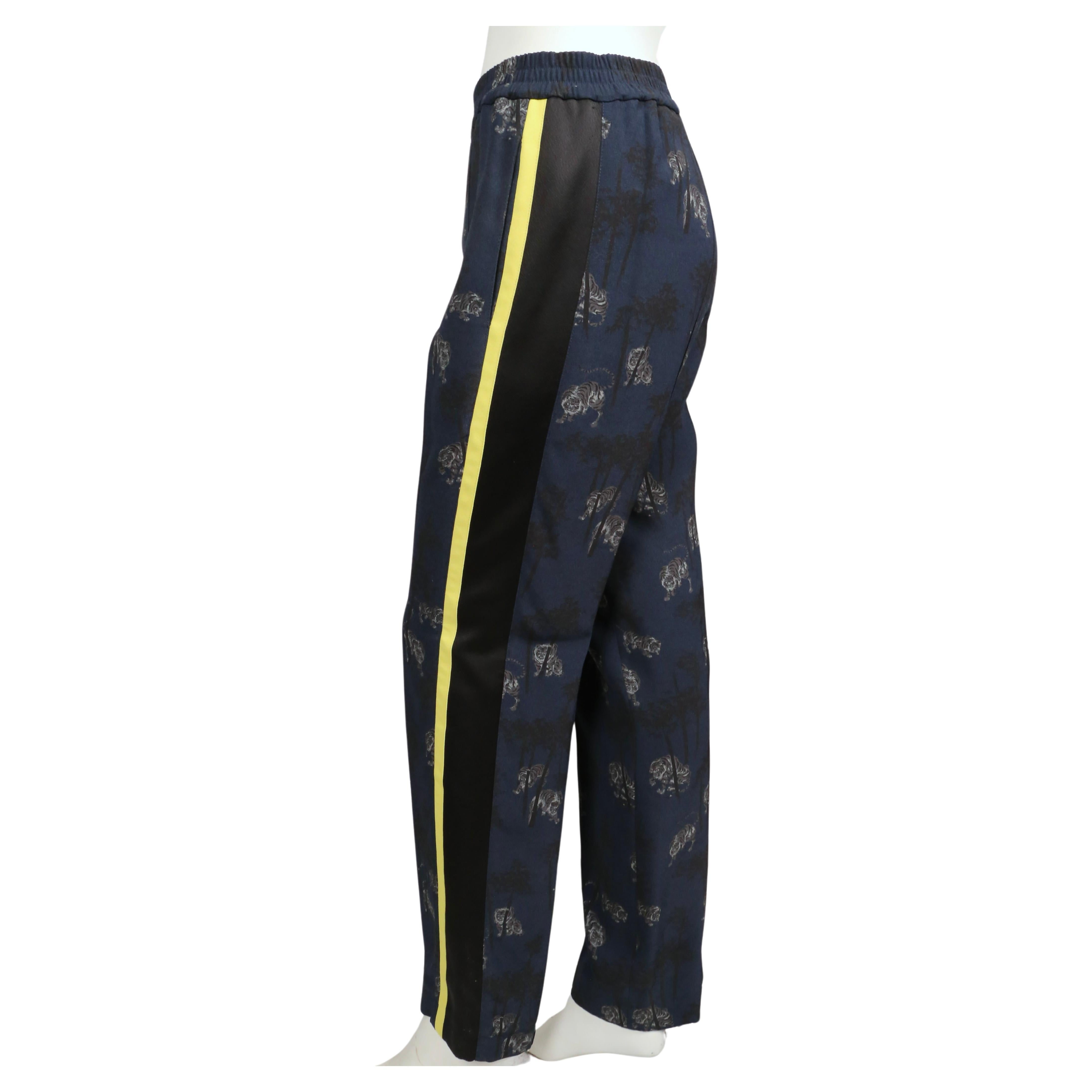 Women's Kenzo tiger print track pants with striped sides For Sale
