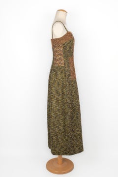 Abito in tweed di Kenzo nei toni del verde, dell'oro e del marrone