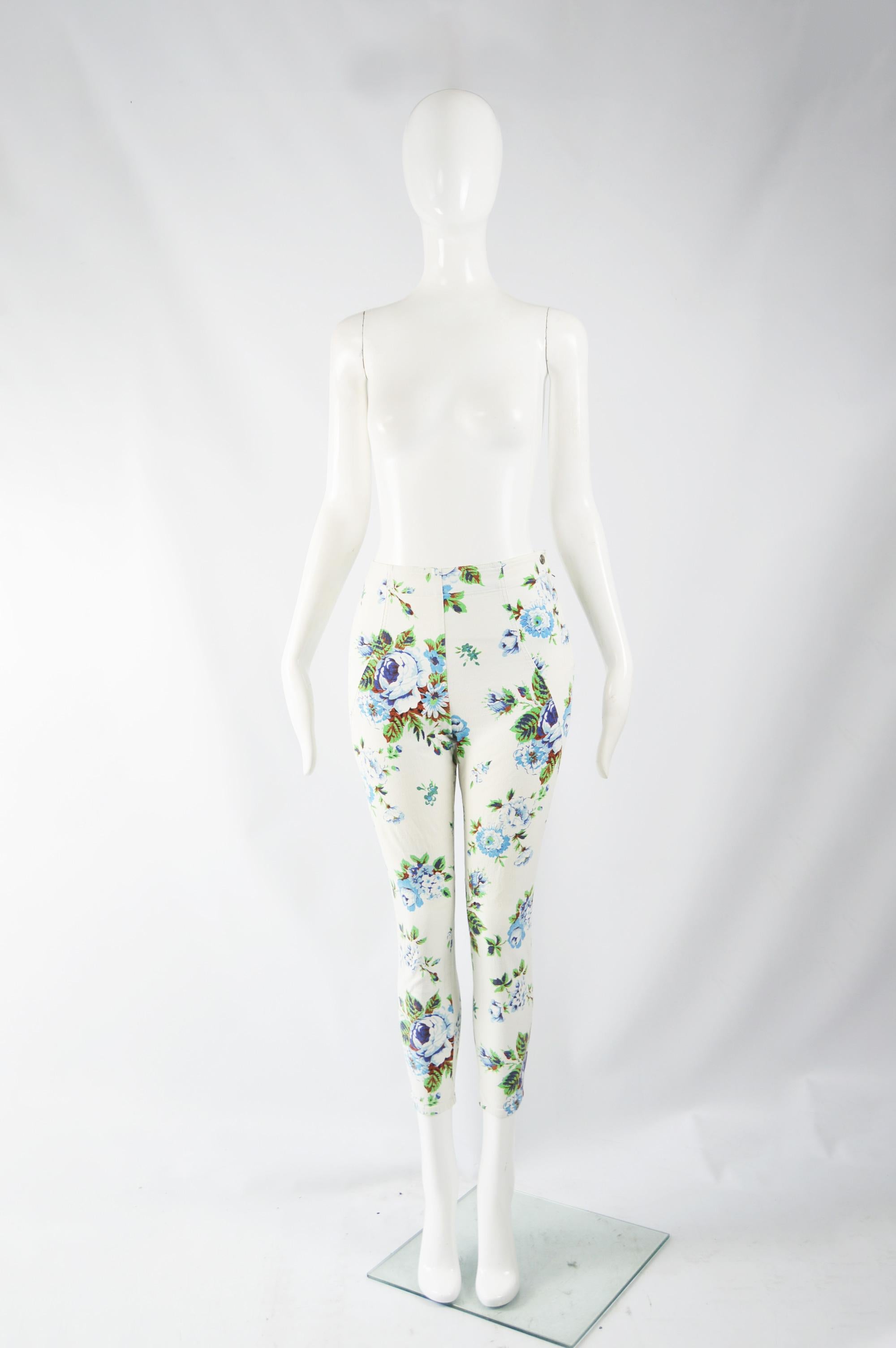 A cute pair of vintage Kenzo cigarette trousers from the 90s. In a white denim with a blue and green floral print, high waist and 1950s capri style cropped legs. 

Size: Marked vintage 38 but fits more like a UK 8/ US 4/ EU 36. Please check