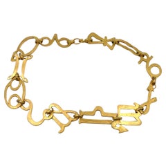 KENZO - Collier Zodiac vintage en or 