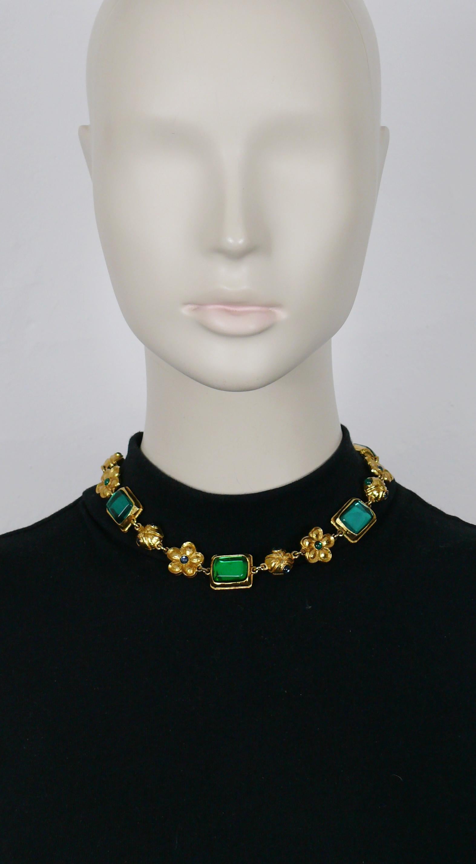KENZO vintage gold tone necklace featuring flowers, rectangular links and balls embellished with blue/green resin and glass cabochons.

T-bar and toggle closure.

Embossed KENZO PARIS.

Indicative measurements : length approx. 40.5 cm (15.94 inches)