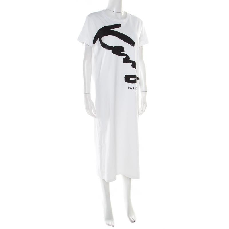 Kenzo creations like this one would make everyone around stop and admire you! The white midi dress is made of 100% cotton and features a relaxed silhouette. It flaunts the brand's signature printed in an artistic way on the front and comes with a