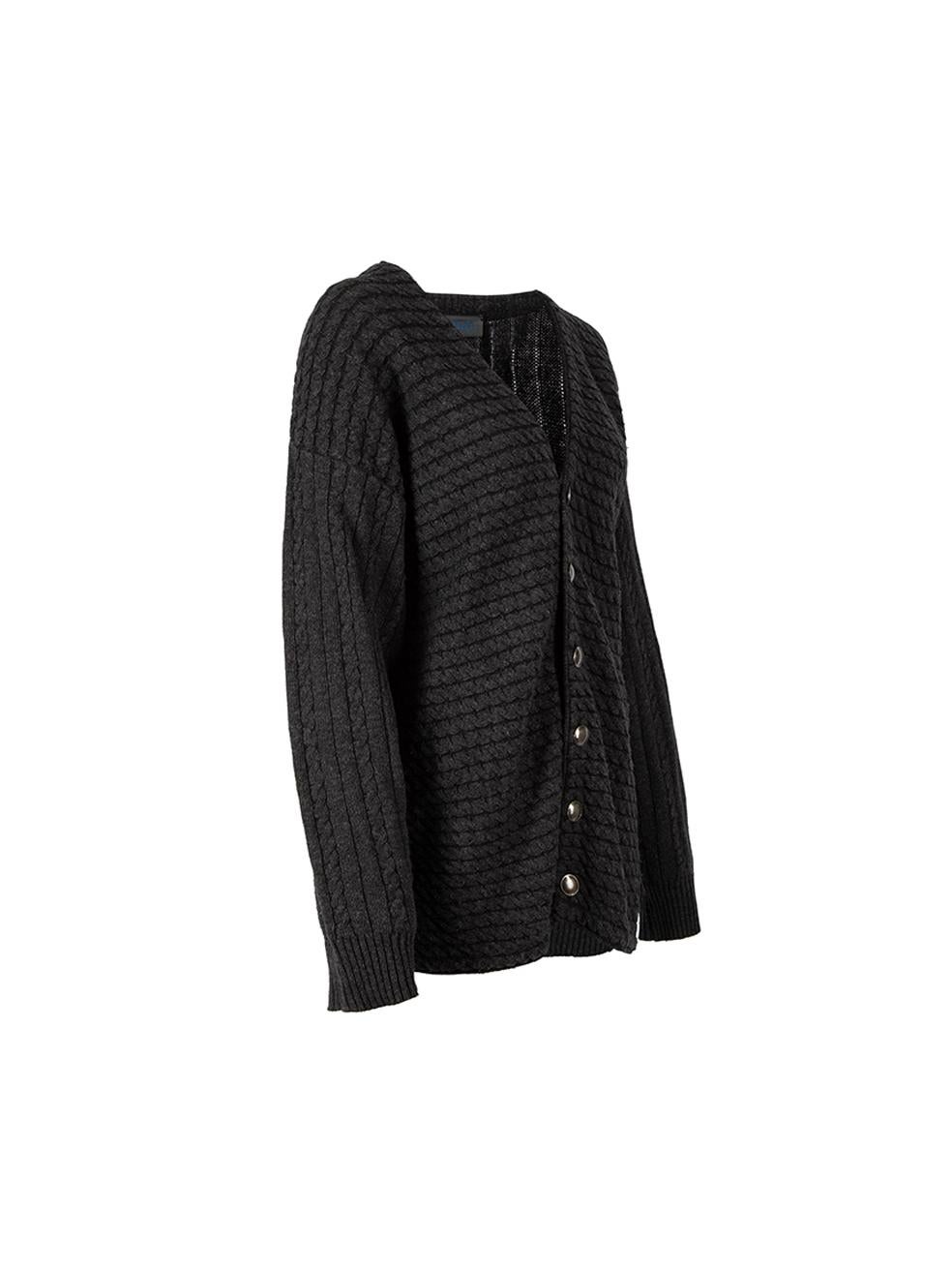 CONDITION is Very good. Minimal wear to cardigan is evident. Minimal wear to the knit with slight bobbling on this used Kenzo designer resale item. 



Details


Charcoal grey

Wool

Long sleeves cardigan

Chunky knit textured

Front button up
