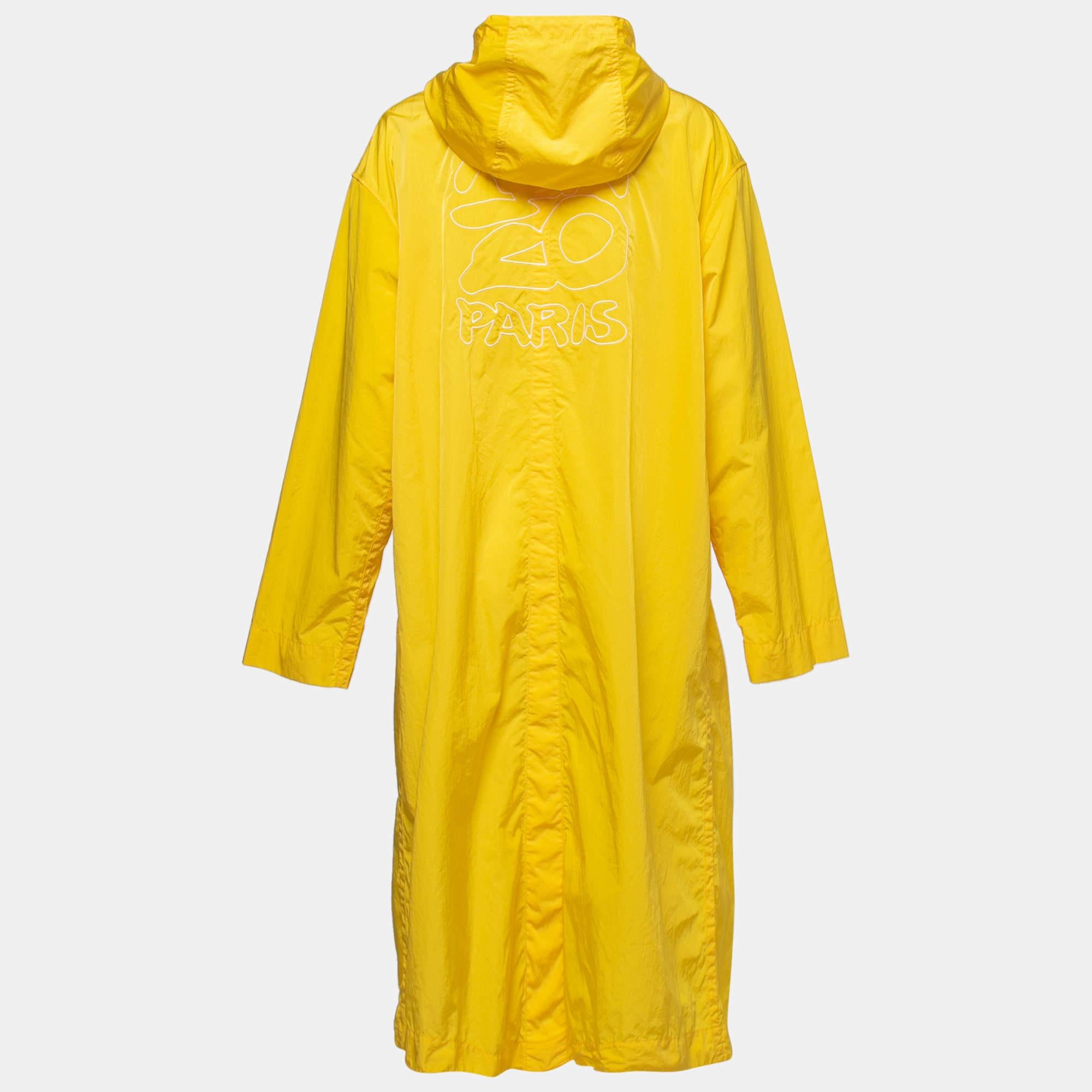 Kenzo brings this super-functional and durable raincoat to protect your outfit during the monsoon season. Designed using yellow synthetic fabric, this raincoat is equipped with a hoodie, buttoned closures, and long sleeves. This helpful accessory is