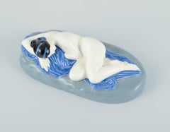 Keramos, Austria. Rare Art Deco ceramic sculpture of a reclining nude woman.
