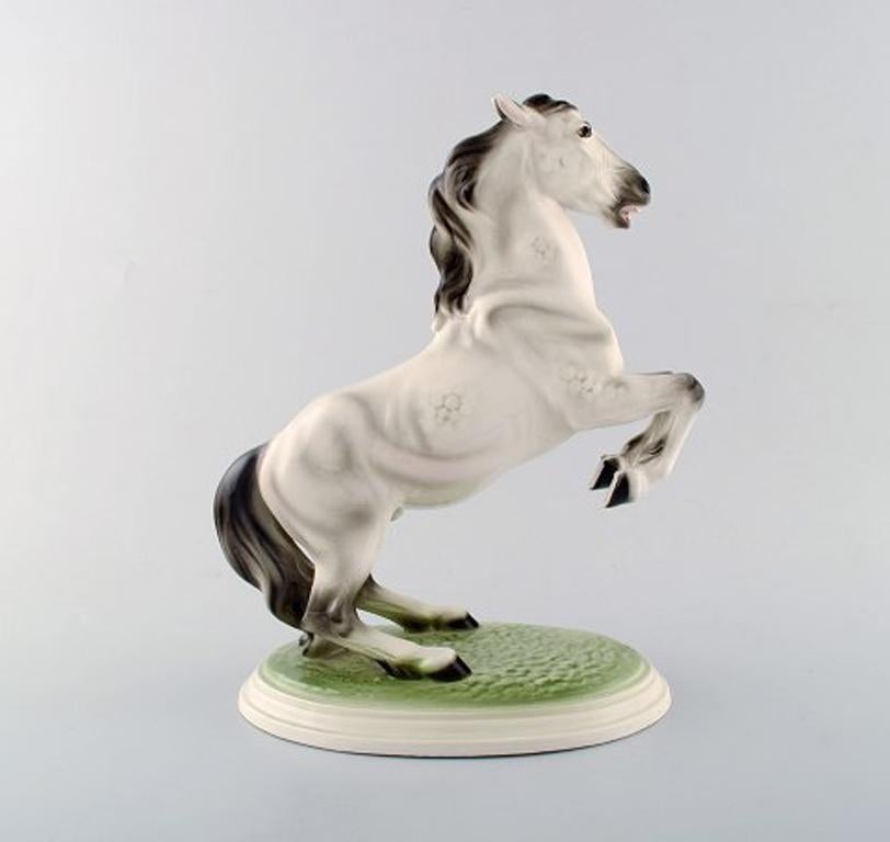Keramos, Vienna. Rearing horse, figure porcelain. Beautiful figure, circa 1940.
Measures: 31 cm. x 25 cm.
In good condition.
Stamped.