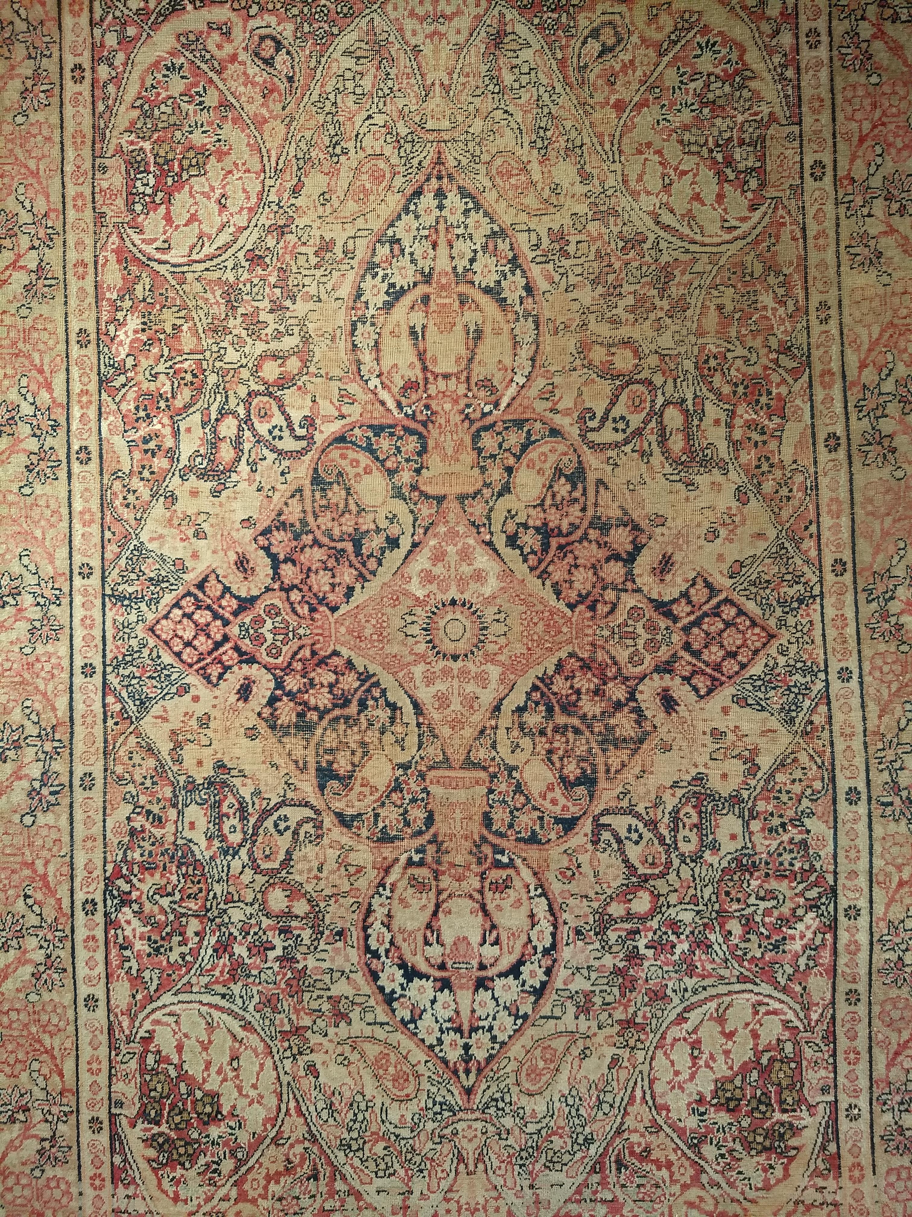 Vegetable Dyed 19th Century Persian Kerman Lavar in Medallion Pattern in Pale Yellow, Red, Blue For Sale