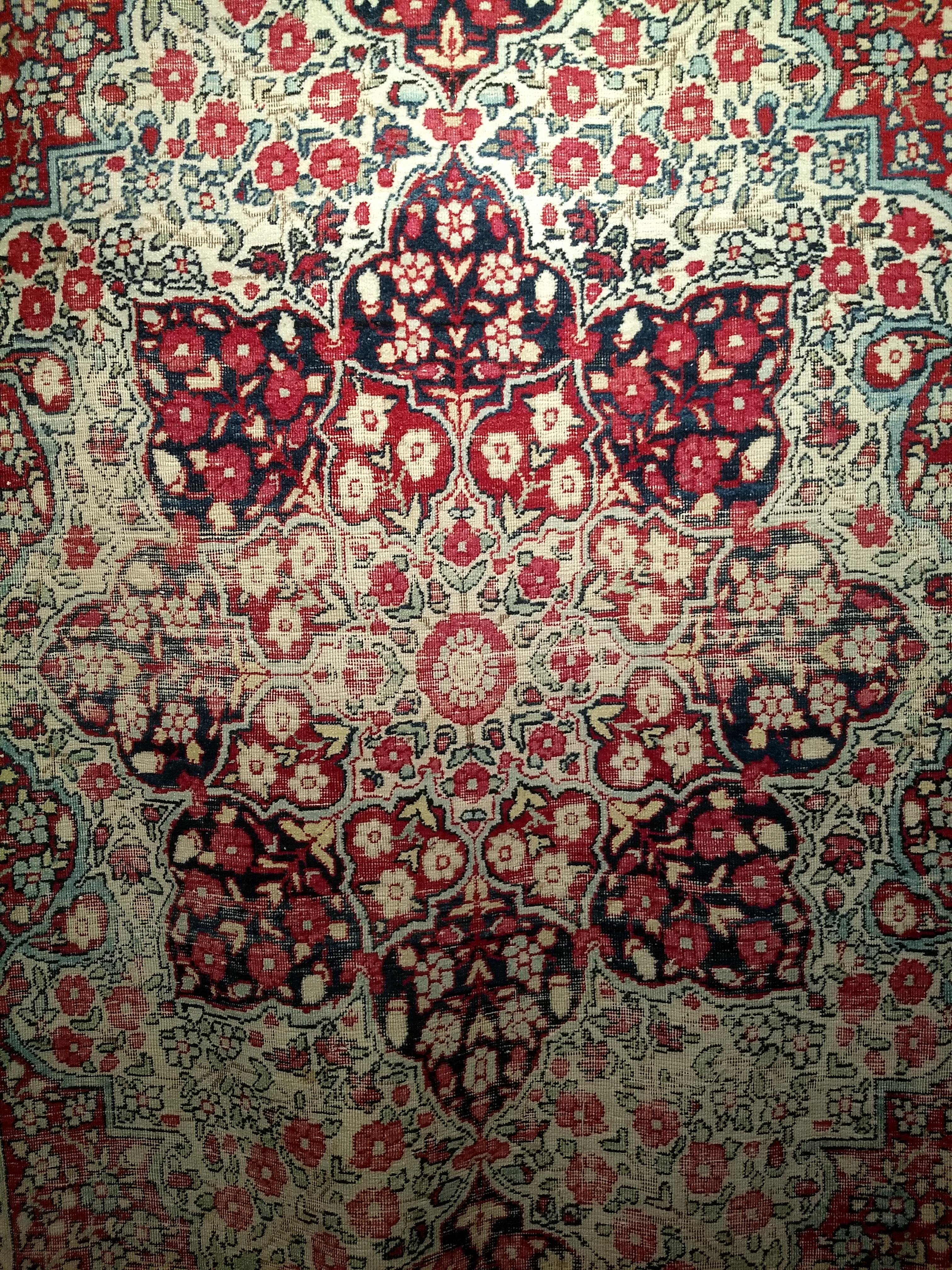 Hand-Woven 19th Century Persian Kerman Lavar Area Rug in Floral Design in Red, Ivory, Black For Sale