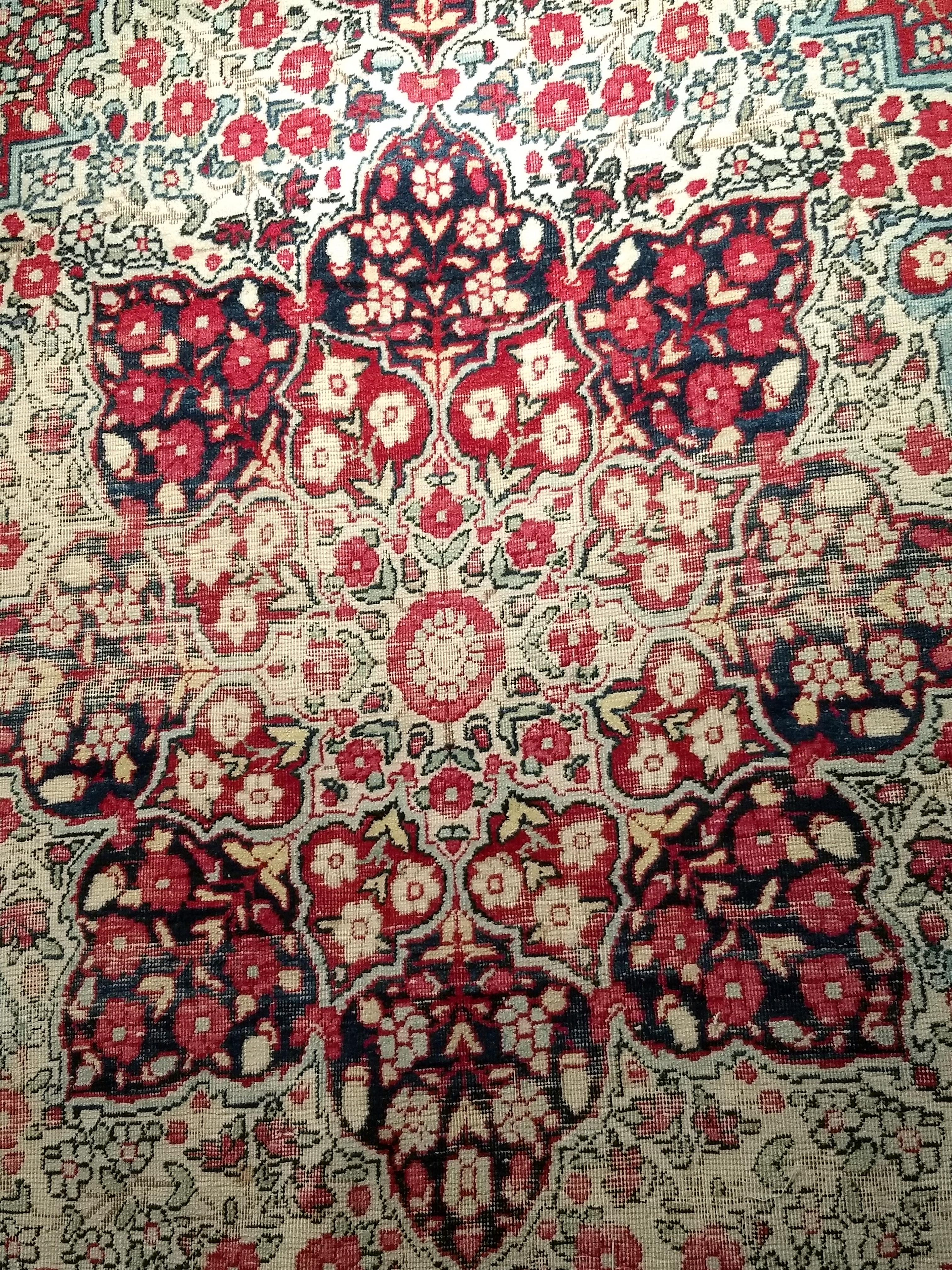 Wool 19th Century Persian Kerman Lavar Area Rug in Floral Design in Red, Ivory, Black For Sale