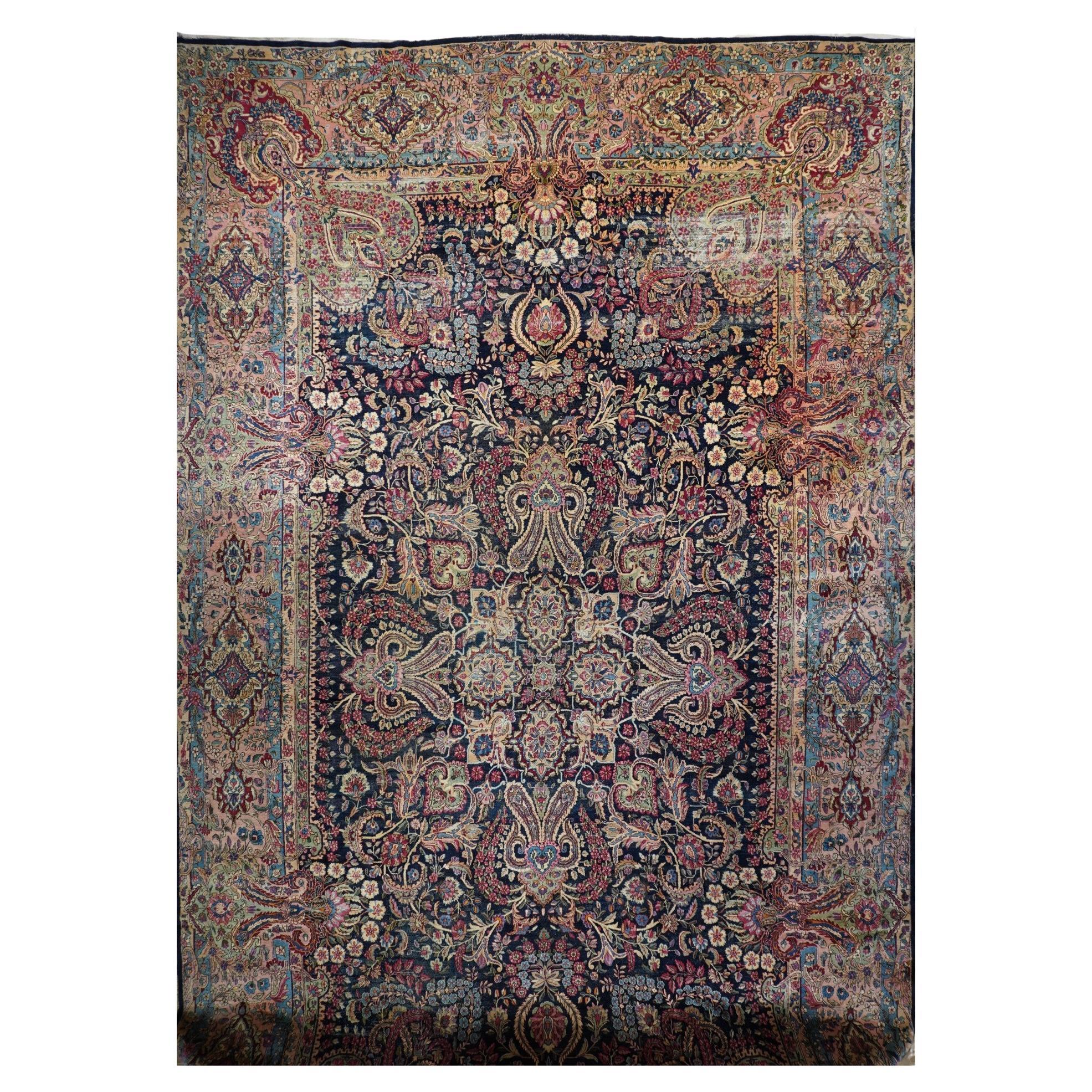 Fine tapis persan ancien Kerman 11'9'' x 20'5''