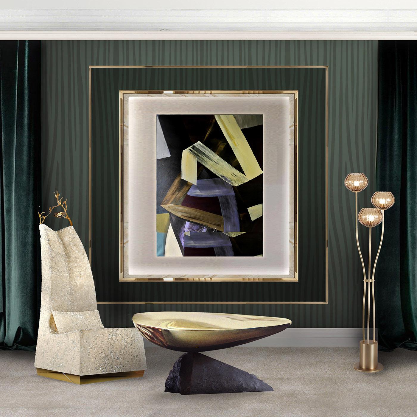 This bespoke coffee table by designer Livio Ballabio and artist Kyoji Nagatani will be sure to be a stunner. A triangular, dark bronze sculpture base serves supports a bright brass swivel top shaped almost like a half-kernel and with a glossy