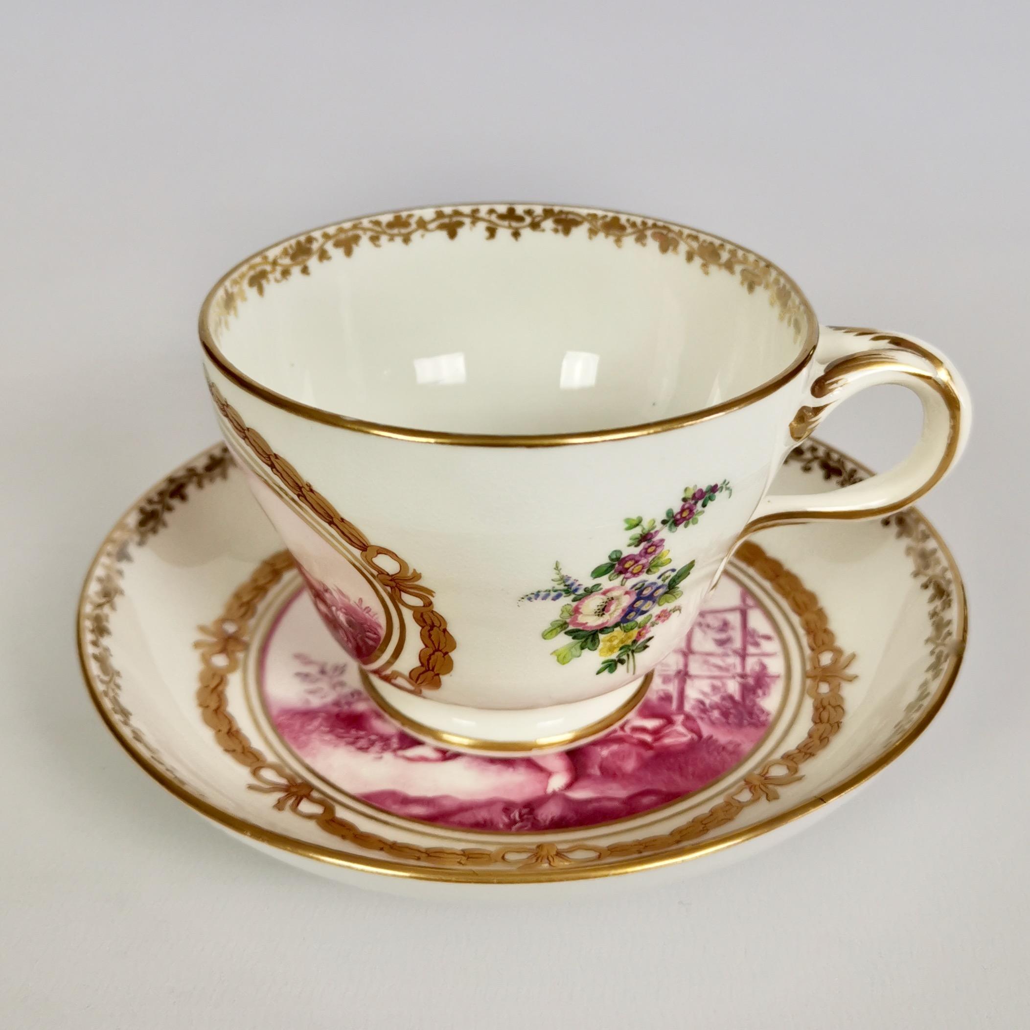 English Kerr & Binns Worcester Porcelain Cup and Saucer, Puce Putti Playing, circa 1855