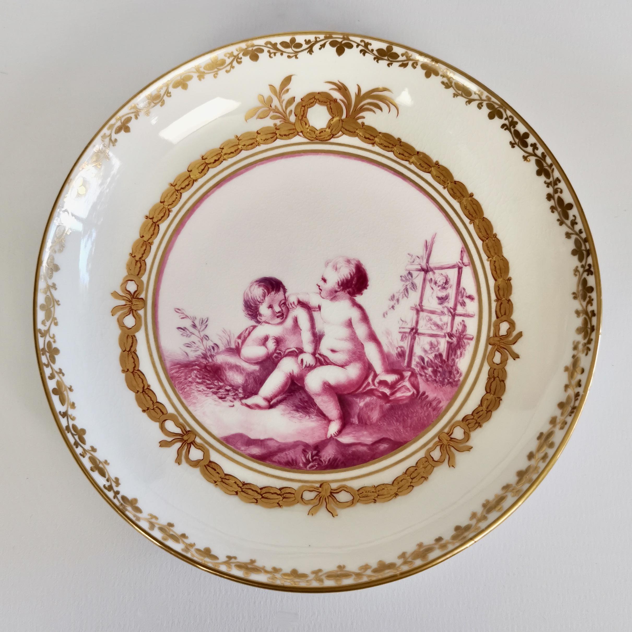Hand-Painted Kerr & Binns Worcester Porcelain Cup and Saucer, Puce Putti Playing, circa 1855