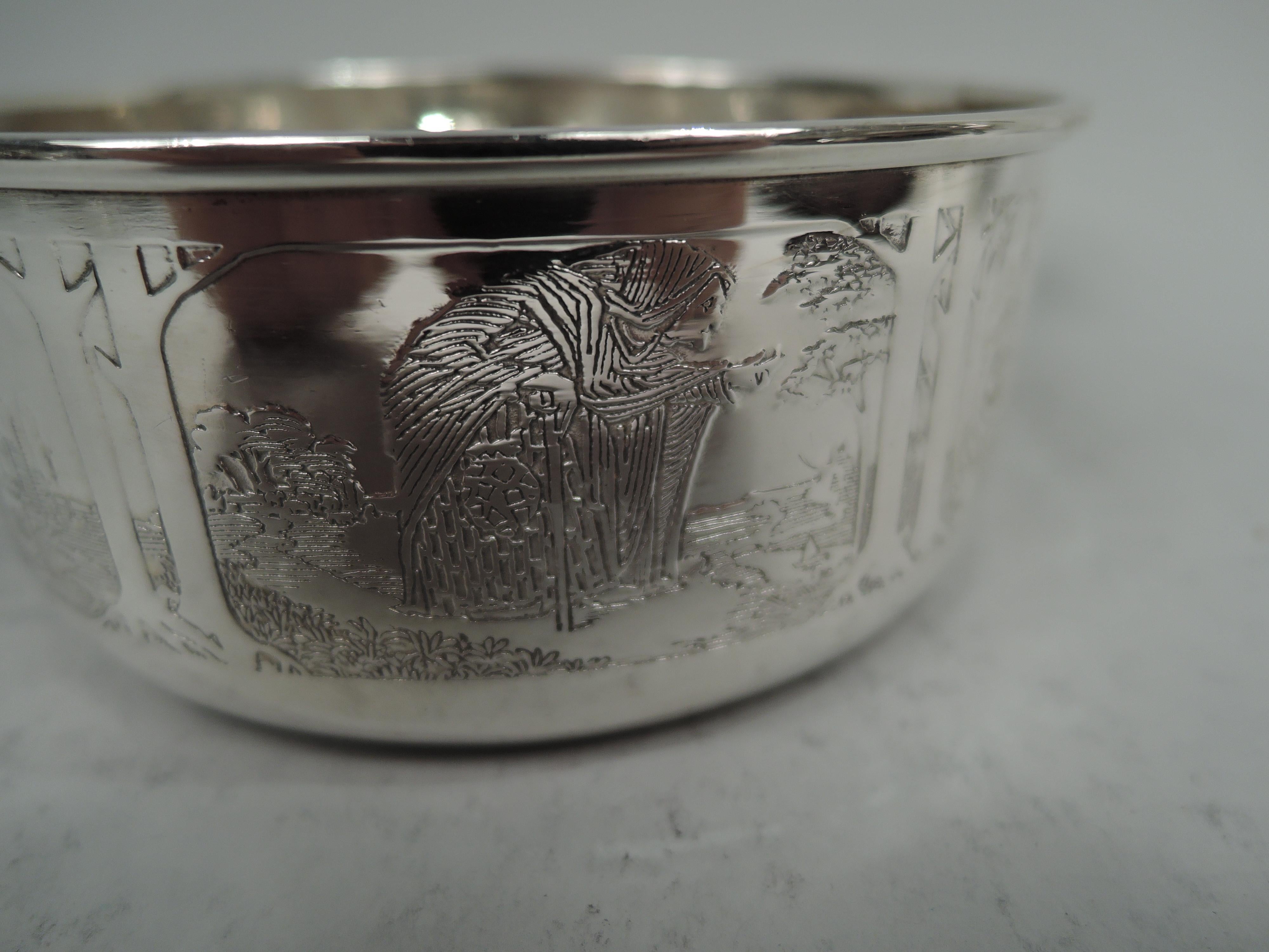 Edwardian Art Nouveau sterling silver porringer. Made by William B. Kerr & Co. in Newark, ca 1910. Round with straight sides shaped solid handle. On exterior are acid-etched fairytale scenes depicting beguiling maidens, stooped crones, and credulous